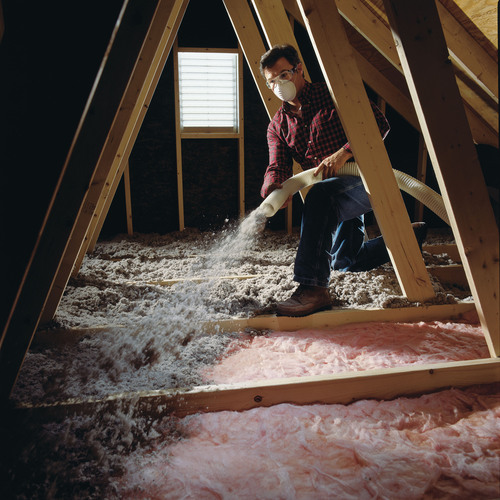 OrkinTherm is recommended for use in attics, a common entry point in homes for pests, but it also can be used in walls. Photo Courtesy of OrkinTherm.  (PRNewsFoto/GreenFiber)
