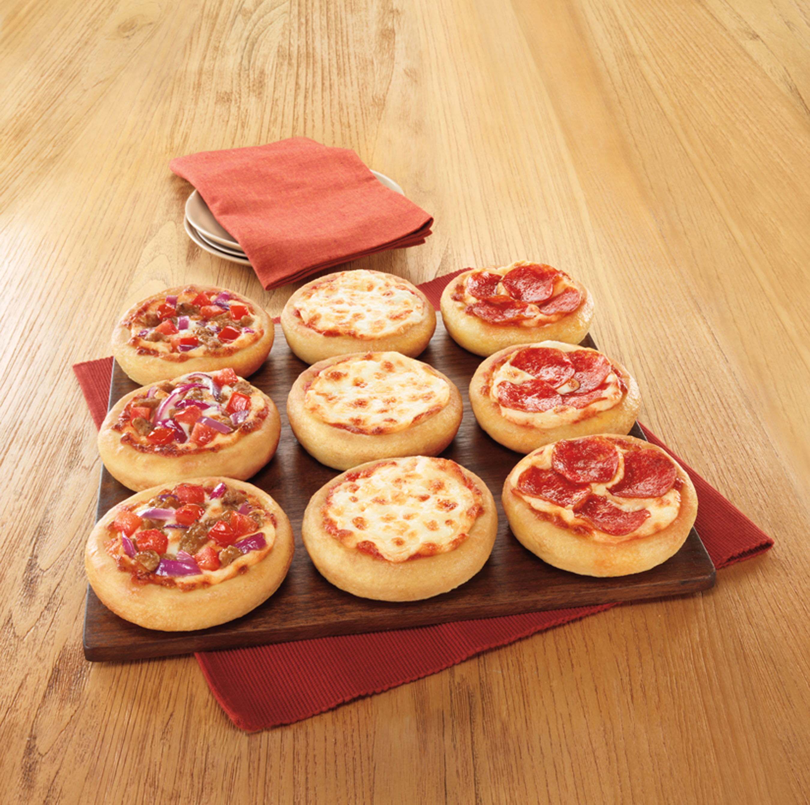 THE SECRET IS OUT: PIZZA HUT UNVEILS BIG PIZZA SLIDERS AS LATEST INNOVATION, GIVES CUSTOMERS A CHANCE TO TRY ONE FREE. (PRNewsFoto/Pizza Hut) (PRNewsFoto/PIZZA HUT)