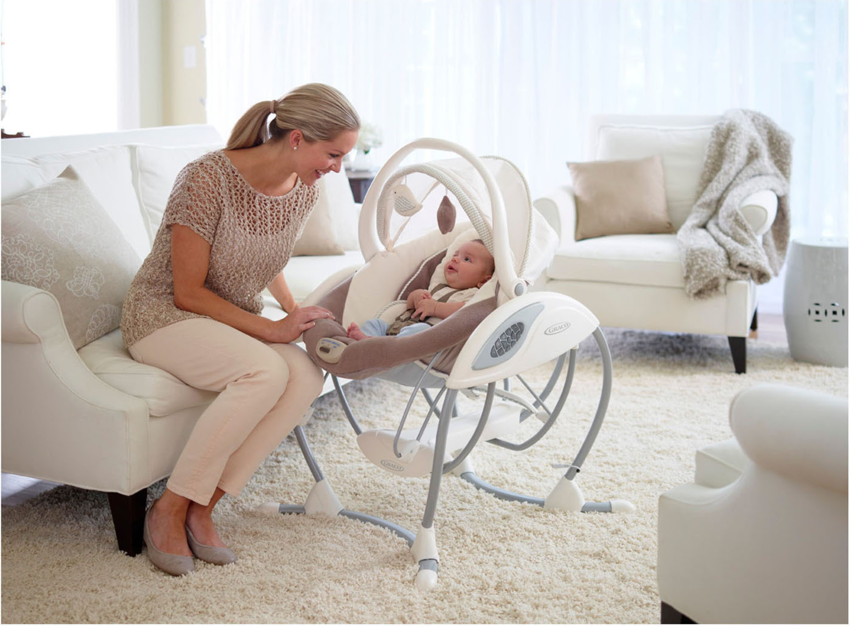 The Graco Glider family of swings aims to reinvent the swing category through the first introduction of the gliding motion into a baby swing. (PRNewsFoto/Graco) (PRNewsFoto/GRACO)