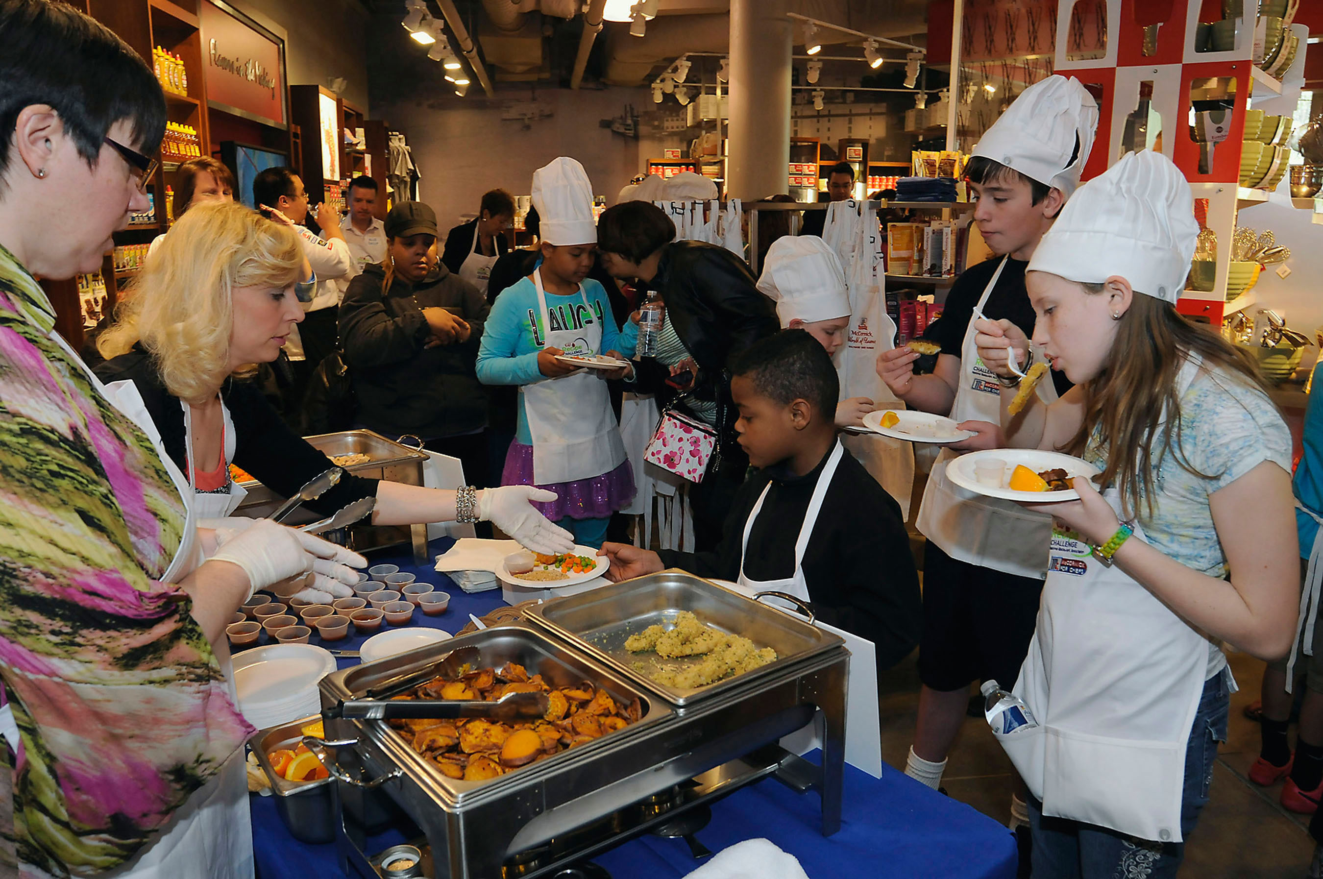 Local Baltimore children taste healthy restaurant dishes for the Kids Recipe Challenge, a nationwide contest from the National Restaurant Association sponsored by McCormick For Chefs. (PRNewsFoto/National Restaurant Association) (PRNewsFoto/NATIONAL RESTAURANT ASSOCIATION)