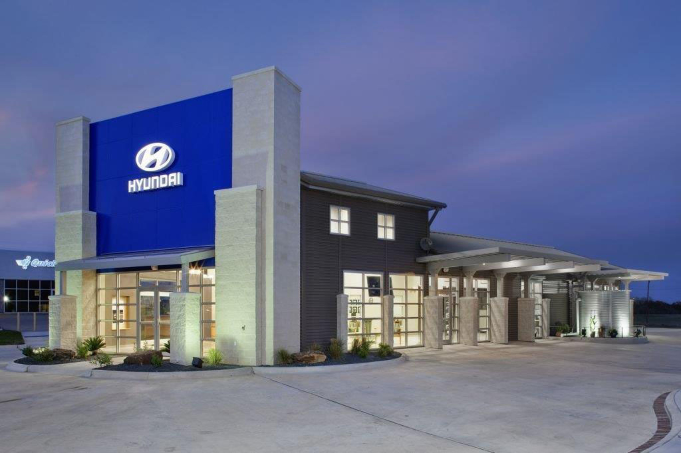 Hyundai of Brenham's exterior shows the extensive use of recycled materials used during construction. The water collection and recycling system can be seen near the rear of the building on the right. (PRNewsFoto/Hyundai Motor America) (PRNewsFoto/HYUNDAI MOTOR AMERICA)
