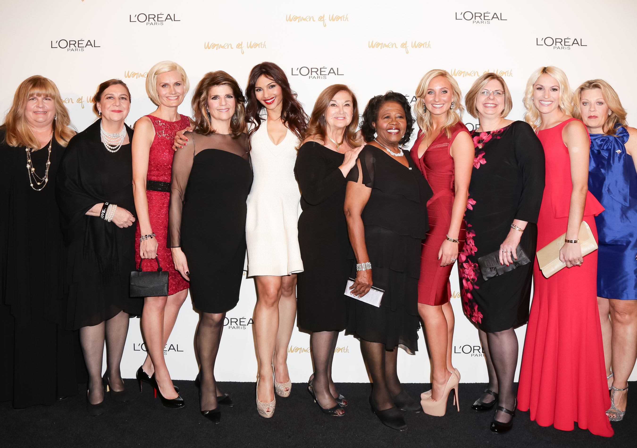 The 2013 L'Oreal Paris Women of Worth honorees, including national honoree Lauren Book and L'Oreal Paris President Karen T. Fondu, were celebrated for making a beautiful difference in their communities at The Pierre on December 3, 2013 in New York City. (PRNewsFoto/L'Oreal Paris) (PRNewsFoto/L'OREAL PARIS)