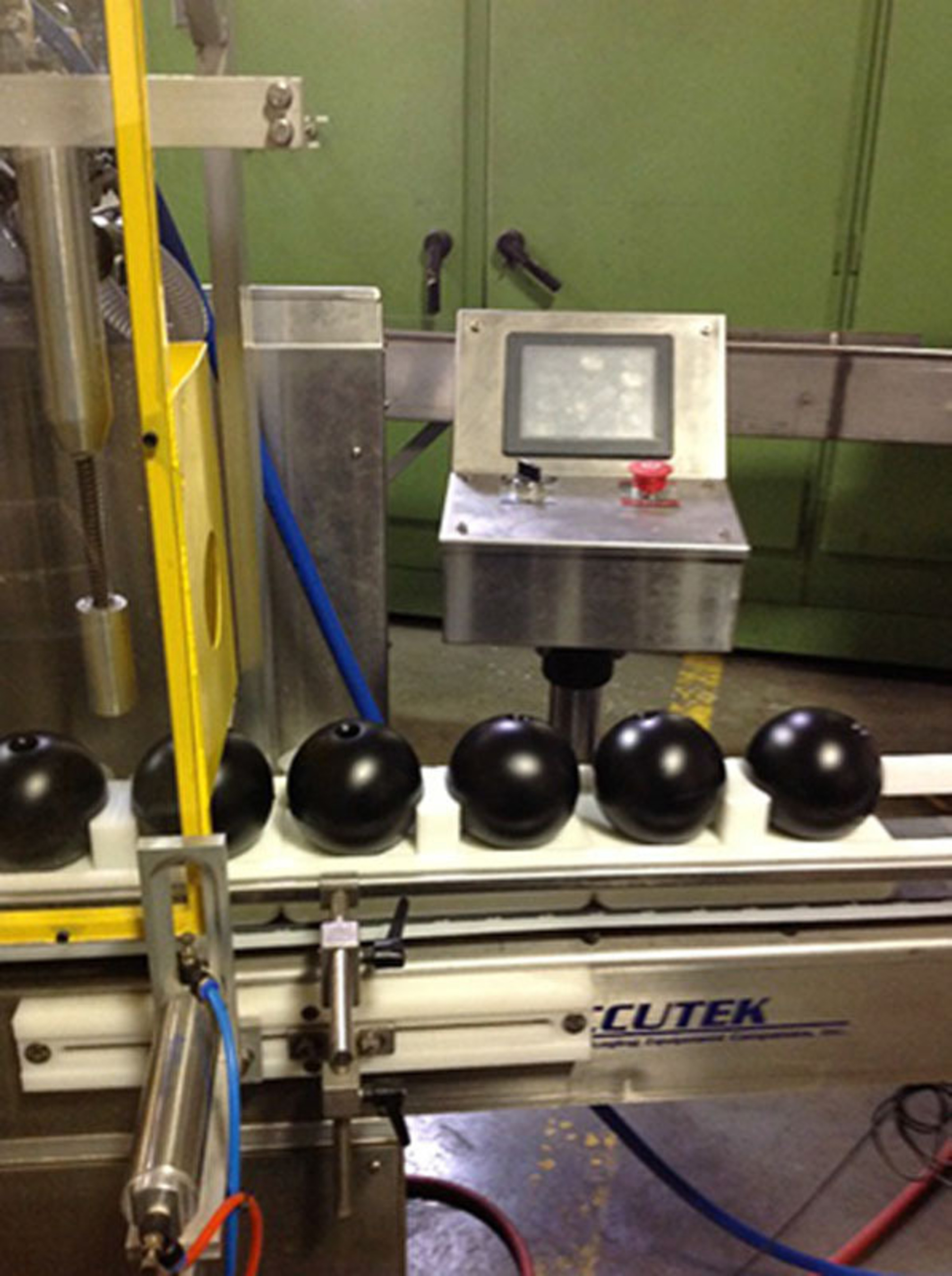 Hollow plastic shade balls leave the production line at XavierC LLC manufacturing facility in Colton, Ca. (PRNewsFoto/XavierC LLC) (PRNewsFoto/XAVIERC LLC)