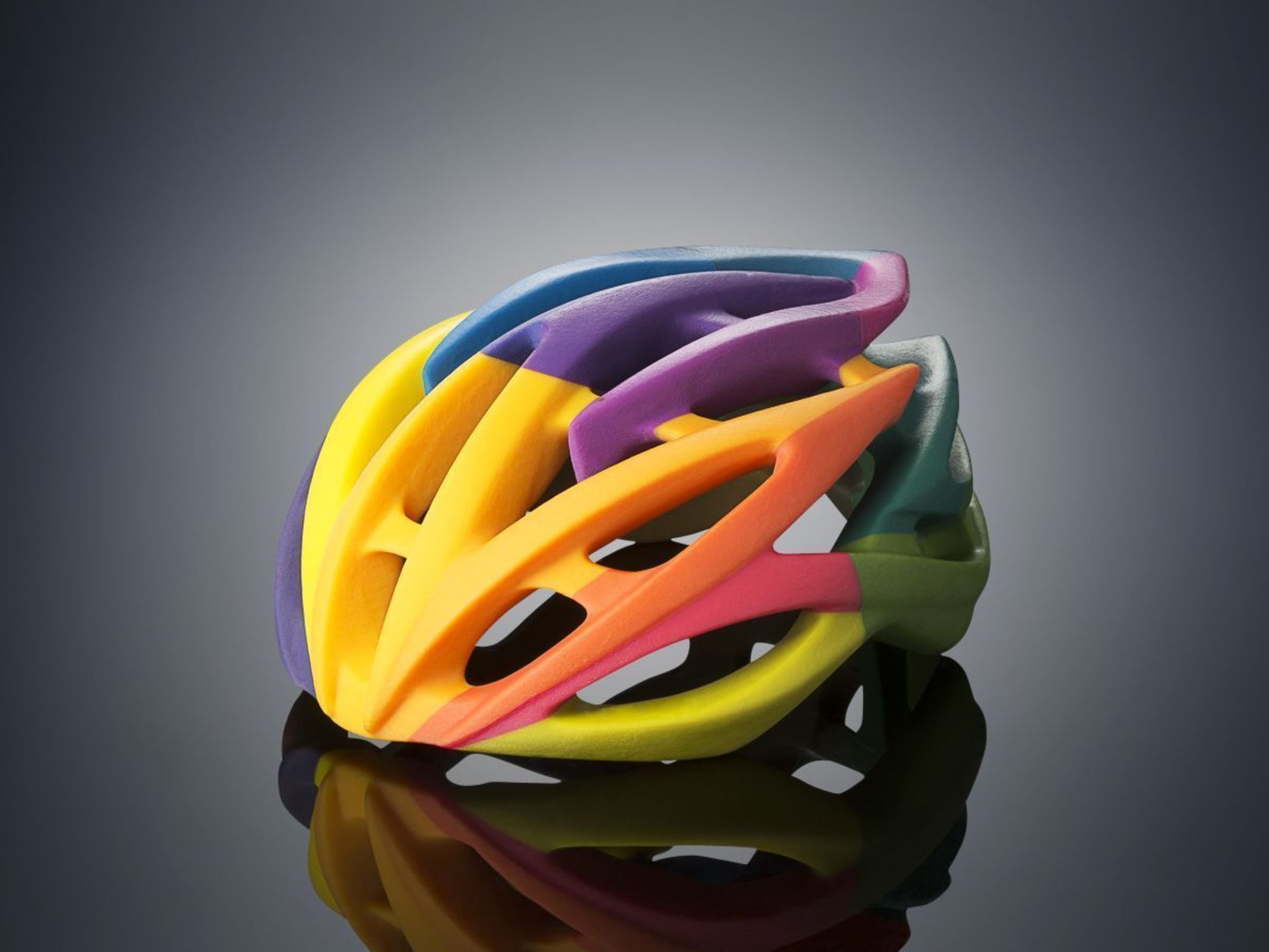 Bike helmet 3D printed on the Objet500 Connex3 Color Multi-material 3D Printer in one print job using VeroCyan, VeroMagenta, and VeroYellow (PRNewsFoto/Stratasys)