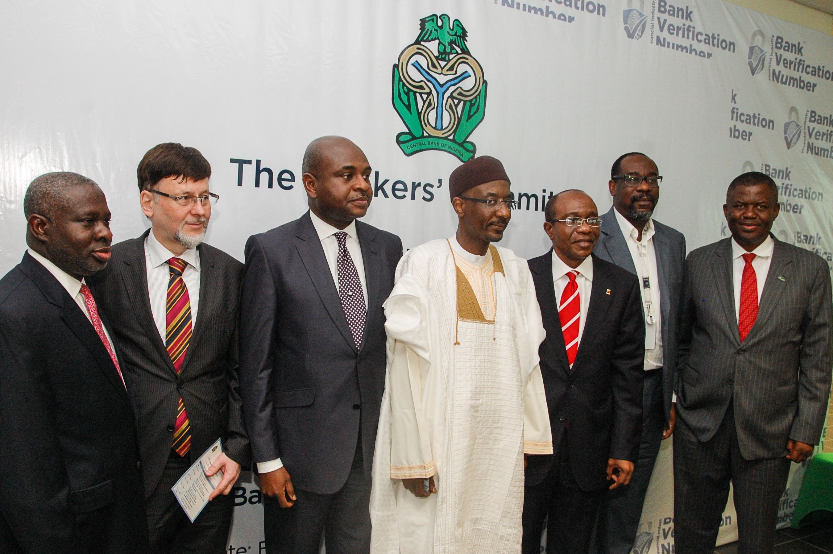 Group photo at the opening ceremony of the DERMALOG biometric system for Nigeria's banks - including the Governor of the Central Bank, Sanusi Lamido Sanusi (centre), and the CEO of DERMALOG, GÃ¼nther Mull (second from left). (PRNewsFoto/DERMALOG Identification Systems)