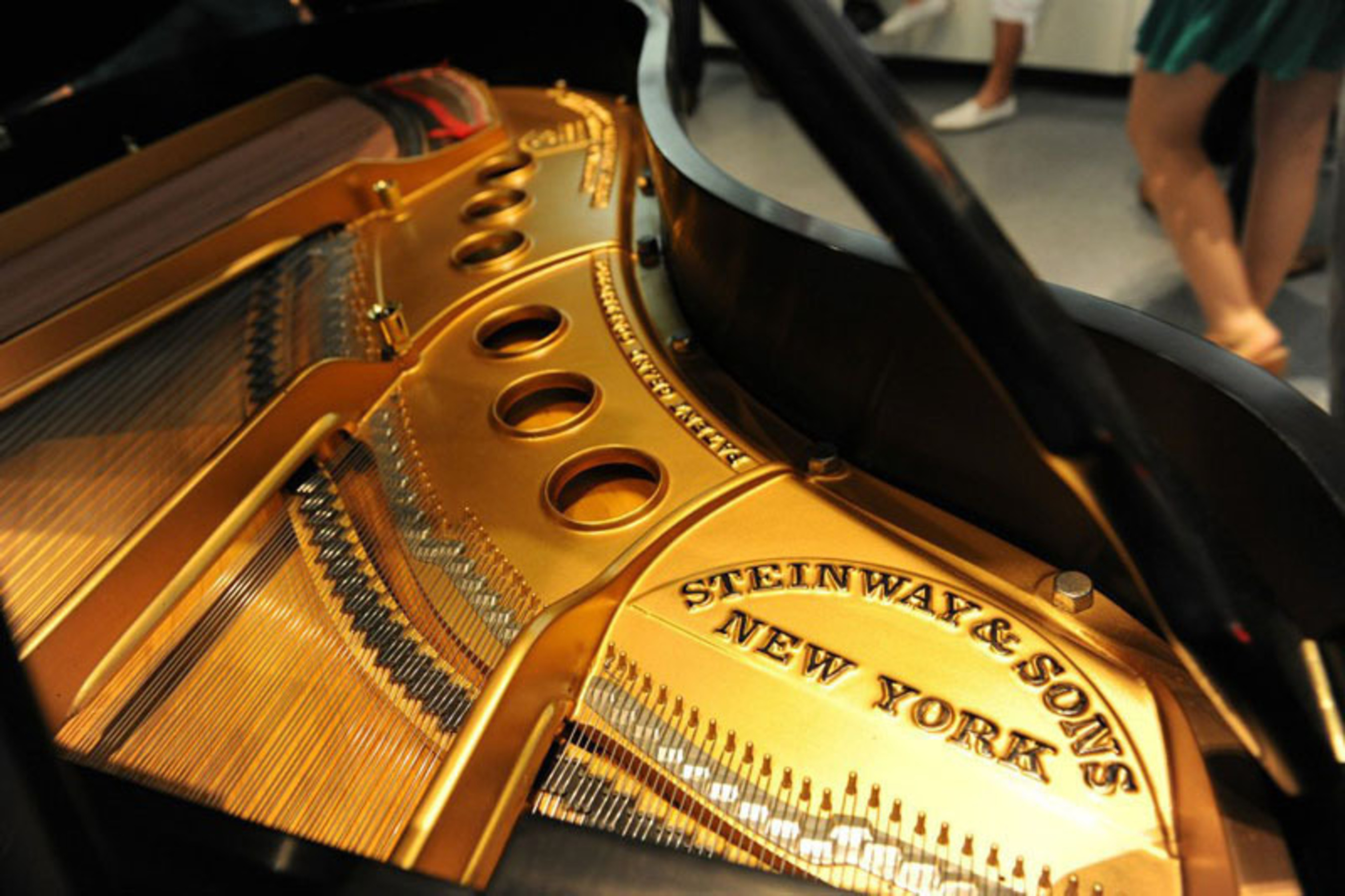 Specialist Steinway Piano dealer showcases Golden Age Steinway Grands alongside Luxury Cars. (PRNewsFoto/Park Avenue Pianos) (PRNewsFoto/PARK AVENUE PIANOS)