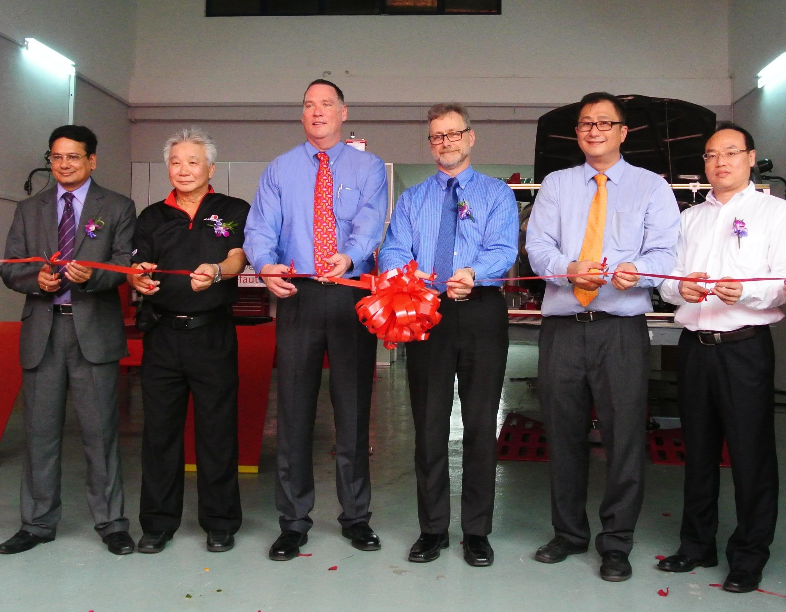 The Chief Automotive Technologies team of (from left to right) Surya Prakash, Stephen Wong, Steve Slaughter, Lee Daugherty, Jason Hans and Li Xun recently helped the company open a new training and specification center in Kuala Lumpur, Malaysia. The facility will give Chief greater access to vehicles built in the Asia-Pacific region for measuring, providing customers with better collision repair specs. (PRNewsFoto/Chief Automotive Technologies)