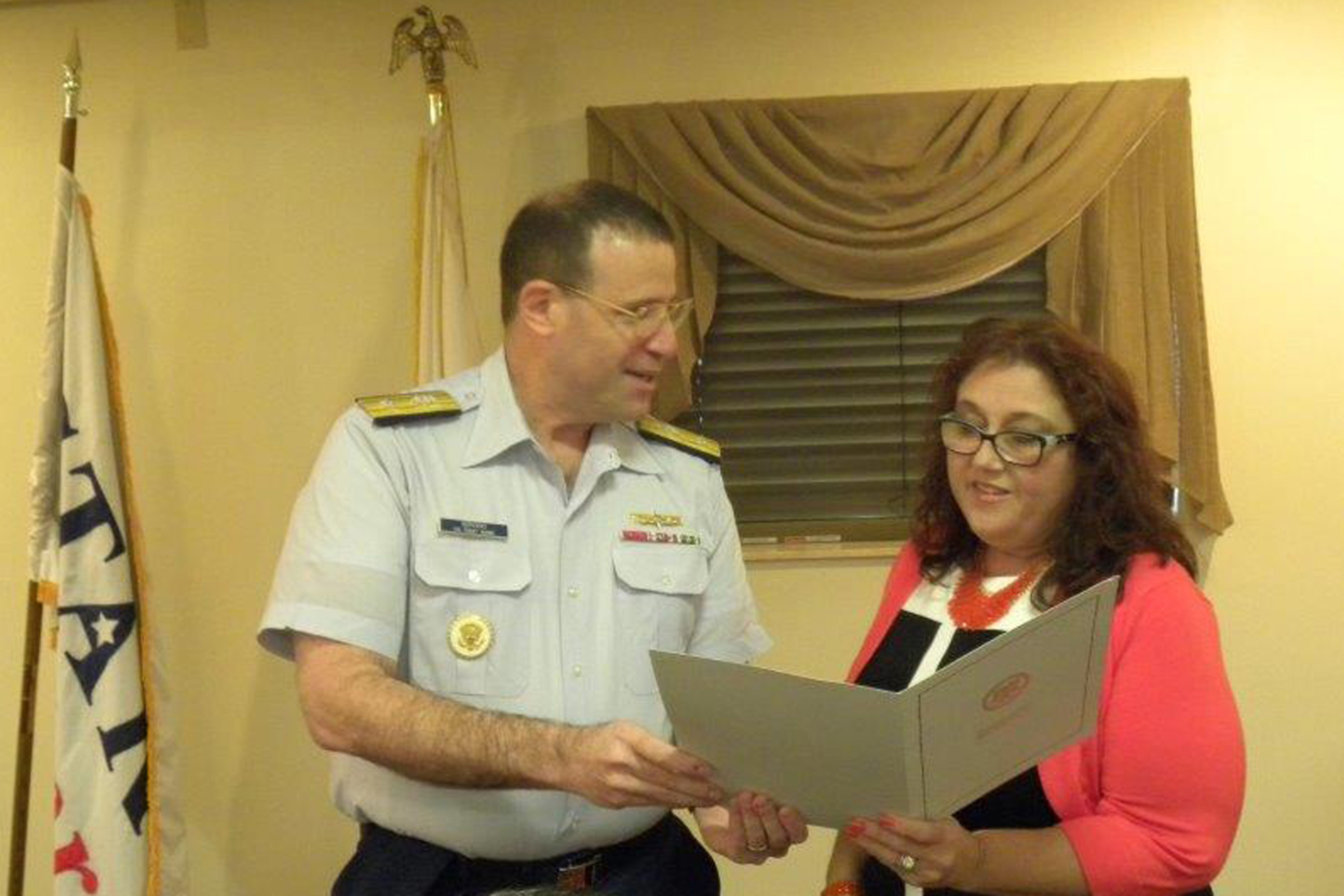 MPT Amy Beavers and USCG by Rear Admiral Joseph Servidio discuss new tole on MERPAC (PRNewsFoto/MPT)