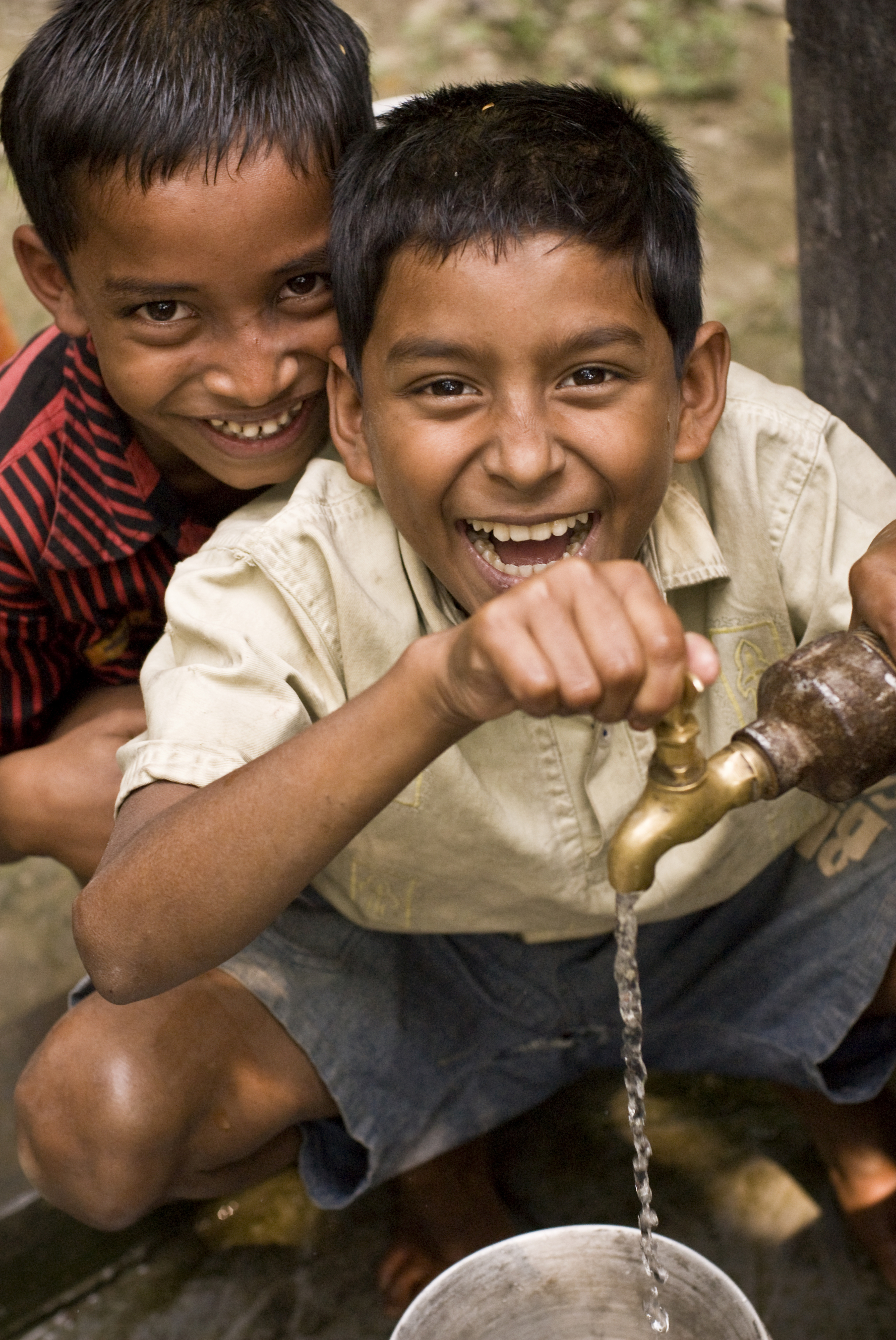 SMI’s project will fund a school’s piped water system in Bangladesh. (PRNewsFoto/SMI)
