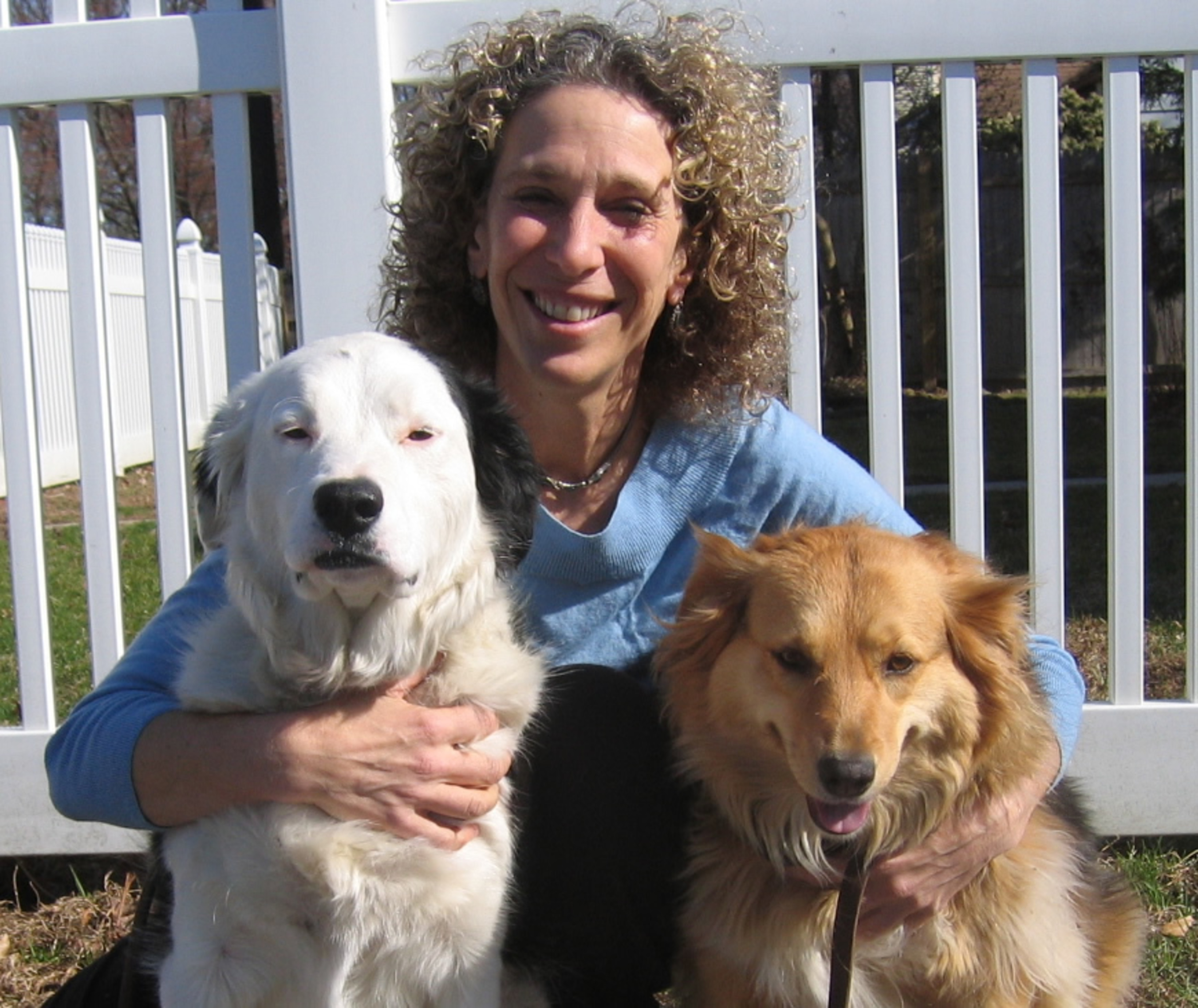 Dr. Fallek with her beloved dogs Destiny and Savannah (PRNewsFoto/Dr. Marcie Fallek)