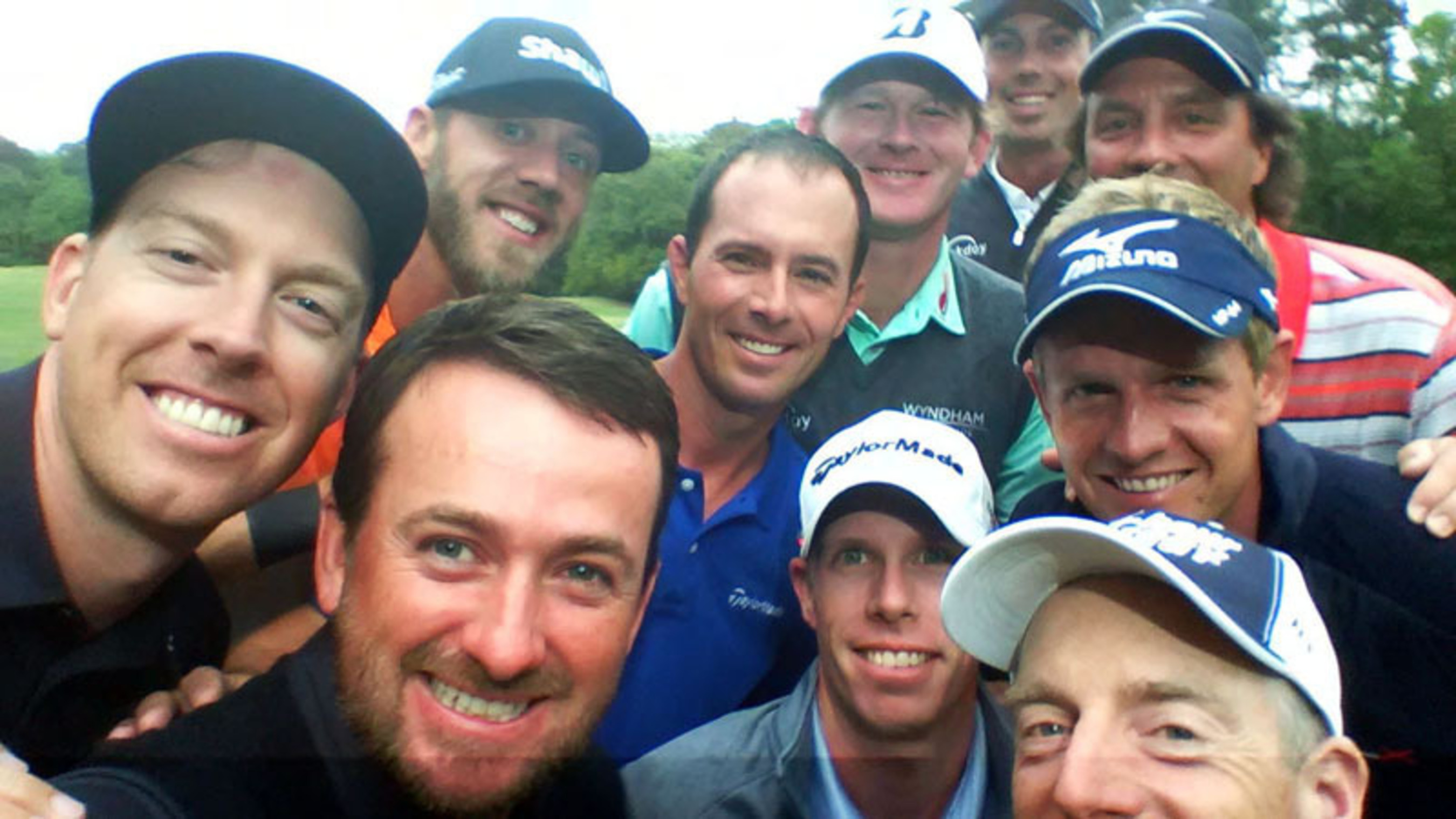 Team RBC golfers gathered in Hilton Head at the RBC Heritage to launch #RBCGolf4Kids, an online challenge designed to raise money and awareness for children's charities. They marked the occasion with a group selfie - dubbed the 'golfie' - including Hunter Mahan, Graeme McDowell, David Hearn, Jim Furyk (left to right, front row); Graham DeLaet, Mike Weir, Luke Donald (left to right, second row); Brandt Snedeker, Stephen Ames (left to right, third row); Matt Kuchar (back row). (PRNewsFoto/RBC) (PRNewsFoto/RBC)
