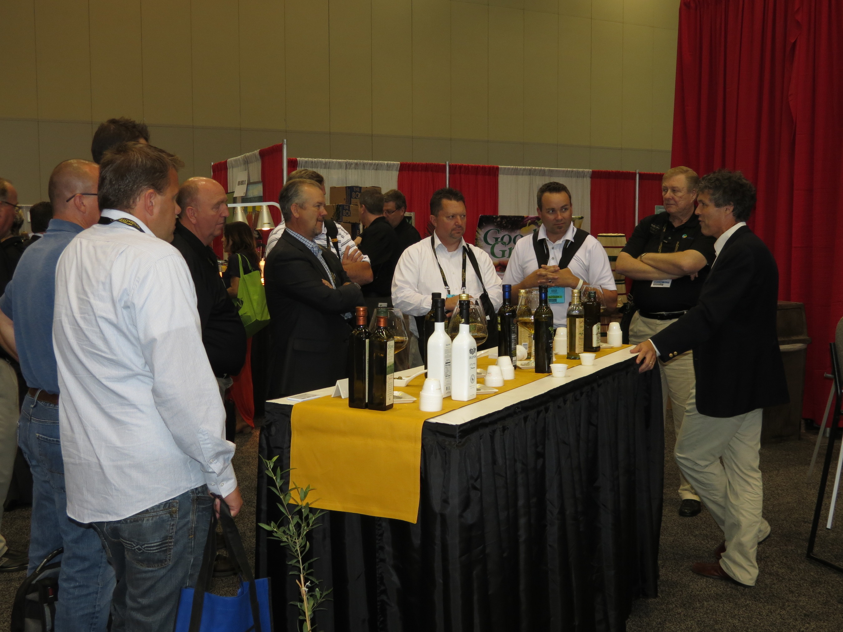 Tom Mueller, author of Extra Virginity: The Sublime and Scandalous World of Olive Oil, speaking to Retailers about olive oil at the 2013 KeHE Holiday Selling & Innovation Show.  (PRNewsFoto/KeHE Distributors, LLC)