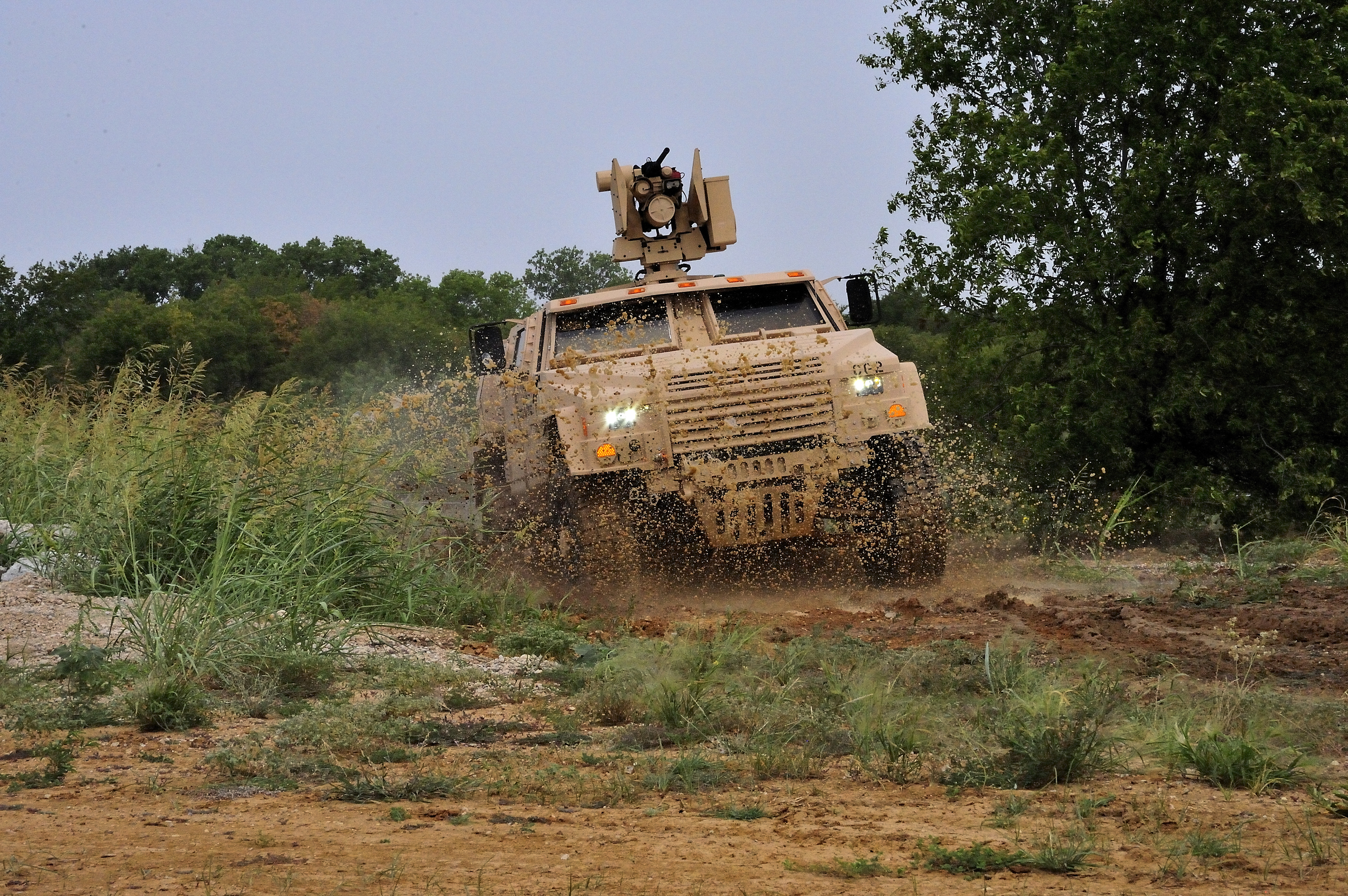 A Lockheed Martin Joint Light Tactical Vehicle undergoes testing at the company's Dallas test track. Lockheed Martin JLTVs have completed more than 100,000 miles of testing during the program's current development phase, and more than 250,000 total miles. (PRNewsFoto/Lockheed Martin)