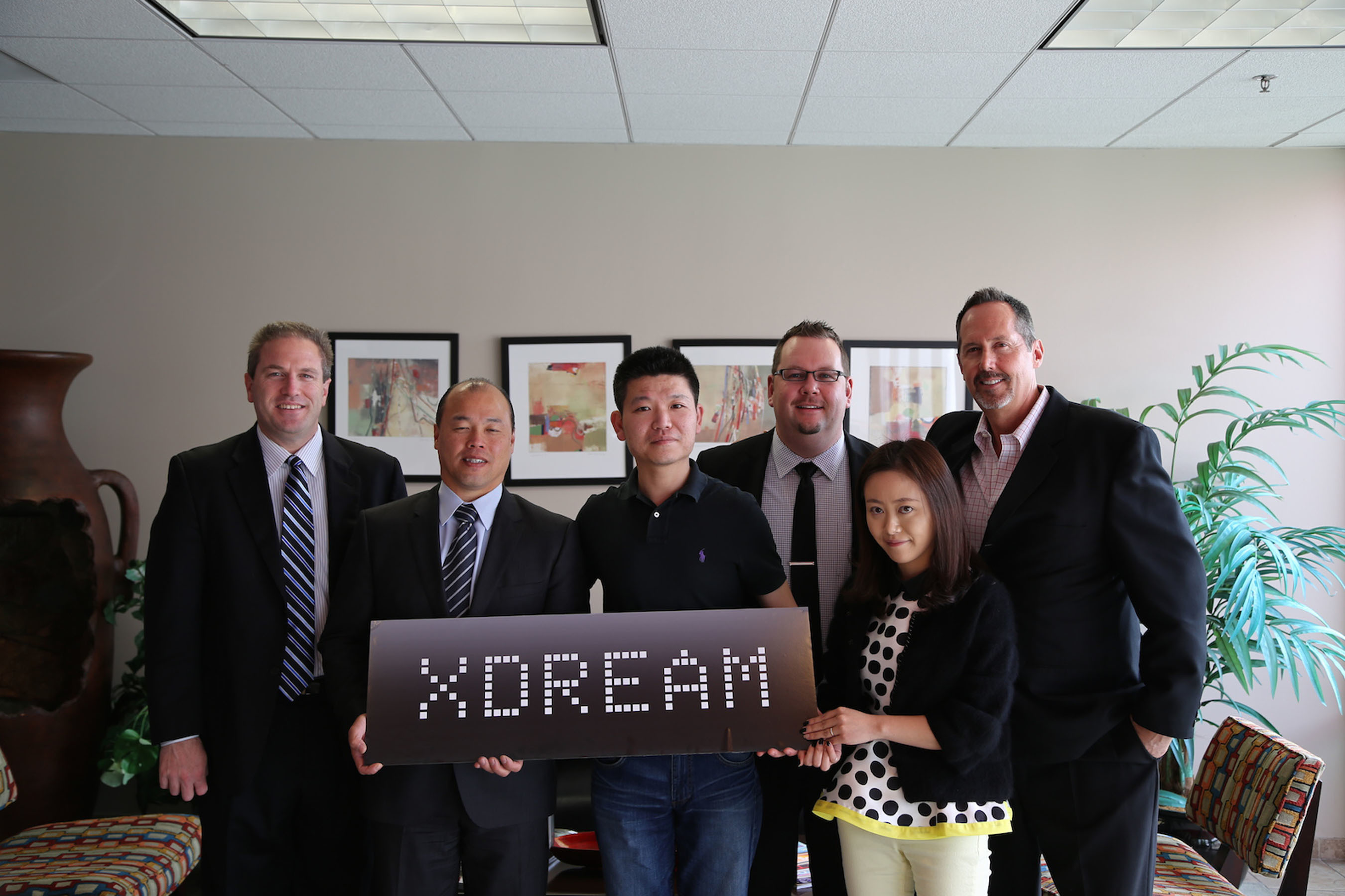 LifeTech Brands and Famous Works Electronics sign an exclusive agreement to distribute XDREAM branded products in North America (LifeTech Brands: Tom Ling – President, Tom Amon – VP of Sales & Marketing, Peter Norton – VP Operations and Ken Colby – Director of Sales & Marketing. Famous Works Electronics: Joy Choi – CEO/President, Vivian Gong – Sales Director) (PRNewsFoto/LifeTech Brands)