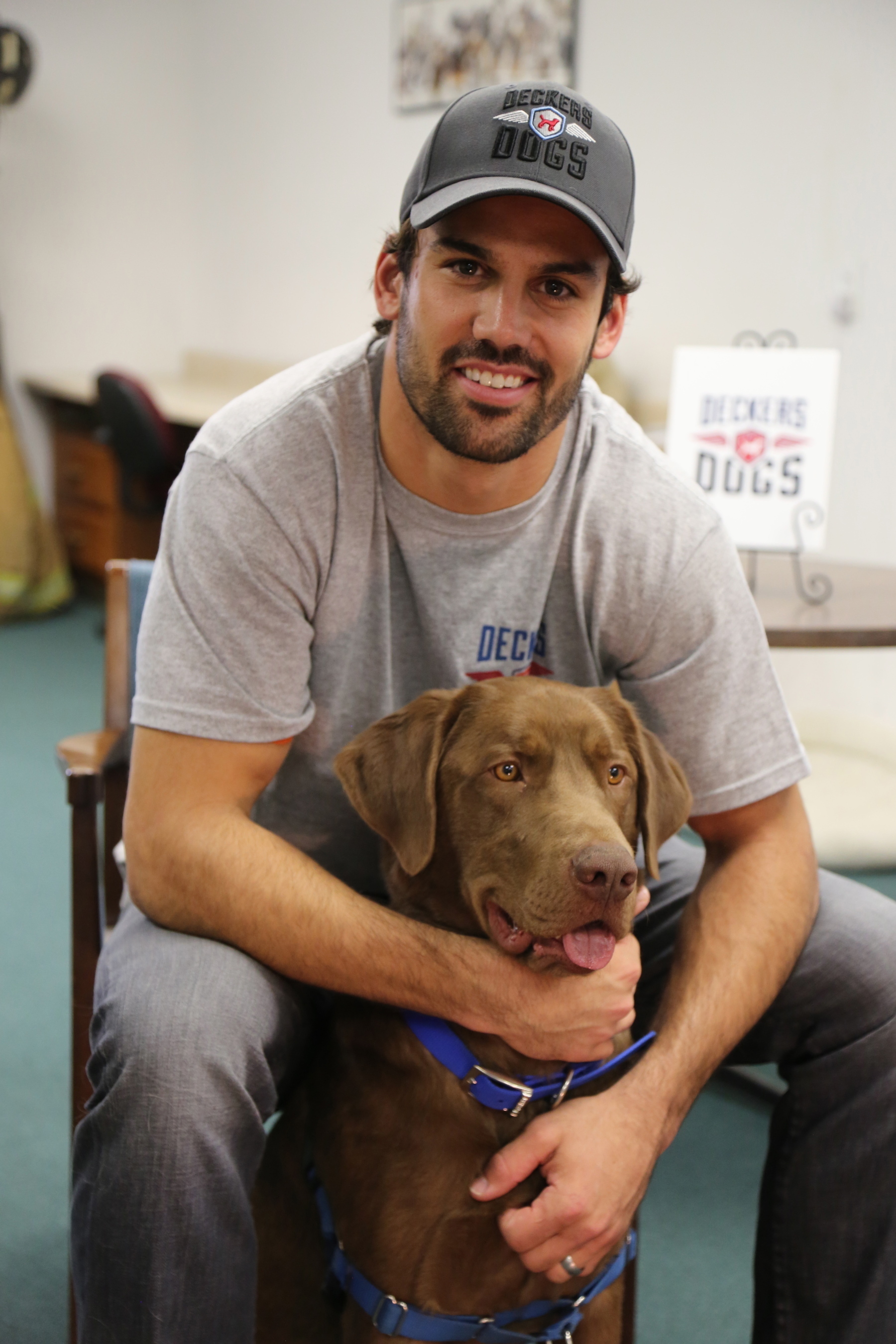 NY Jets' Eric Decker and "Deckers Dogs" Team with Veterinary Pet Insurance (VPI) to Celebrate Pet Parent's Day. For every new quote generated at petparentsday.com through Memorial Day (May 26), VPI will donate $5 to Deckers Dogs to help fund the rescue, care and training of service dogs for our military veterans returning home with disabilities. (PRNewsFoto/Deckers Dogs)