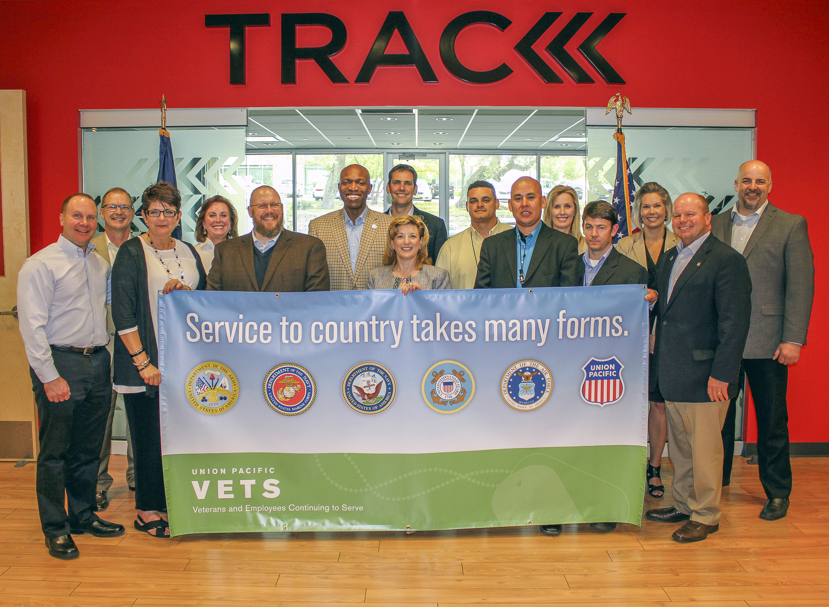 Union Pacific employees and military veterans present a $150,000 donation to Wounded Warrior Project (WWP) representatives at WWP's San Antonio TRACK facility, Monday, April 21, 2014. (PRNewsFoto/Union Pacific)