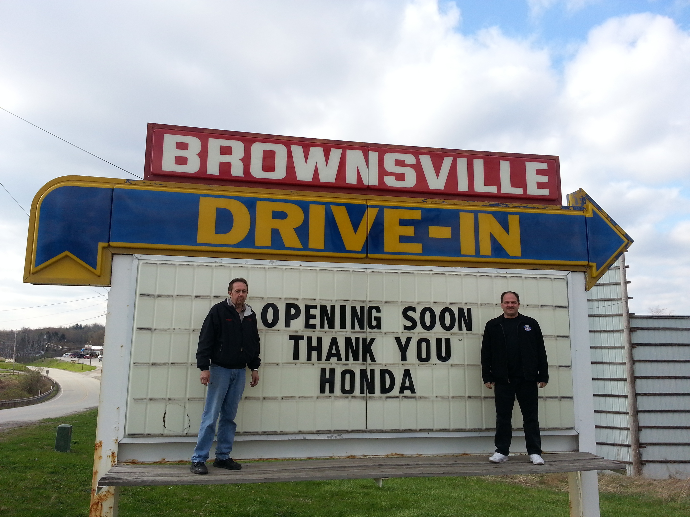Brownsville Drive-In owner, John Sebeck and theater manager, Charlie Perkins thank Honda for the funds donated through Project Drive-In. (PRNewsFoto/American Honda Motor Co., Inc.)