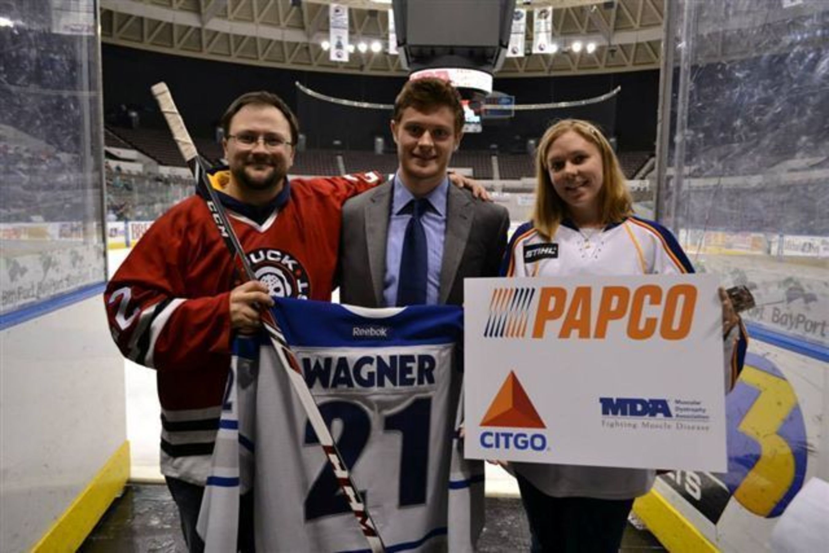 PAPCO Inc. and CITGO MDA Jersey Auction participant Jack Miceli, Norfolk Admirals hockey player Chris Wagner and Brenda Goodson at Scope Arena raising awareness for muscular dystrophy. (PRNewsFoto/CITGO)