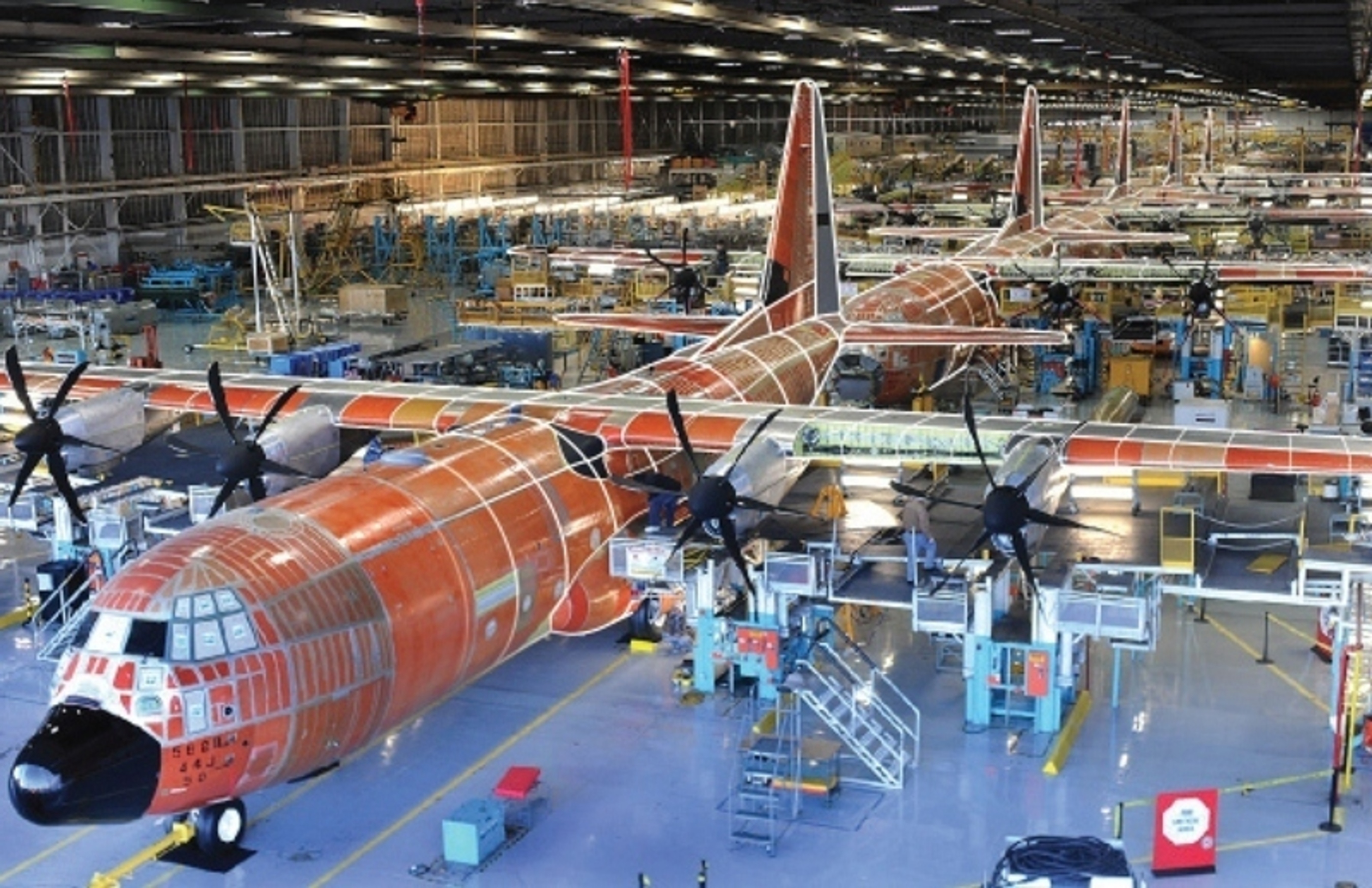 Lockheed Martin Aeronautics’ C-130J Super Hercules production line at the Marietta, Georgia facility. The C-130J incorporates state-of-the-art technology, which reduces labor requirements, lowers operating and support costs, and provides life cycle cost-savings over earlier C-130 models. (PRNewsFoto/Lockheed Martin)