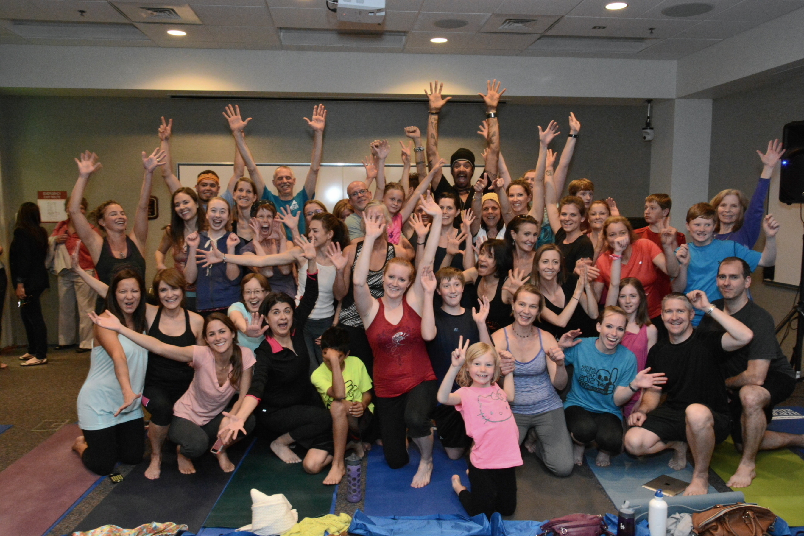 Life was better today thanks to a special visit from Michael Franti. The singer-songwriter, humanitarian, and child author visited Denver Health to do yoga with Denver Health employees before performing at the Denver Health Nightshine Gala, April 26. (PRNewsFoto/Denver Health)