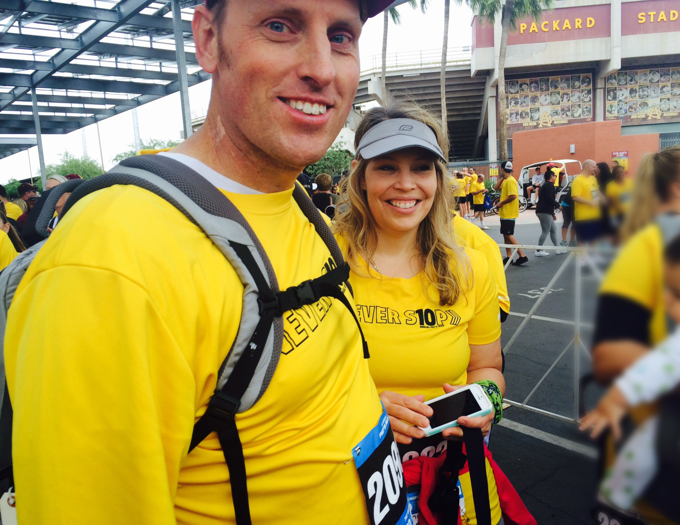 Randy and Tiffany Shepherd share smiles before walking in Pat's Run. Randy made history that day by becoming the first SynCardia Total Artificial Heart patient to enter and complete the 4.2-mile course. (PRNewsFoto/SynCardia Systems, Inc.)