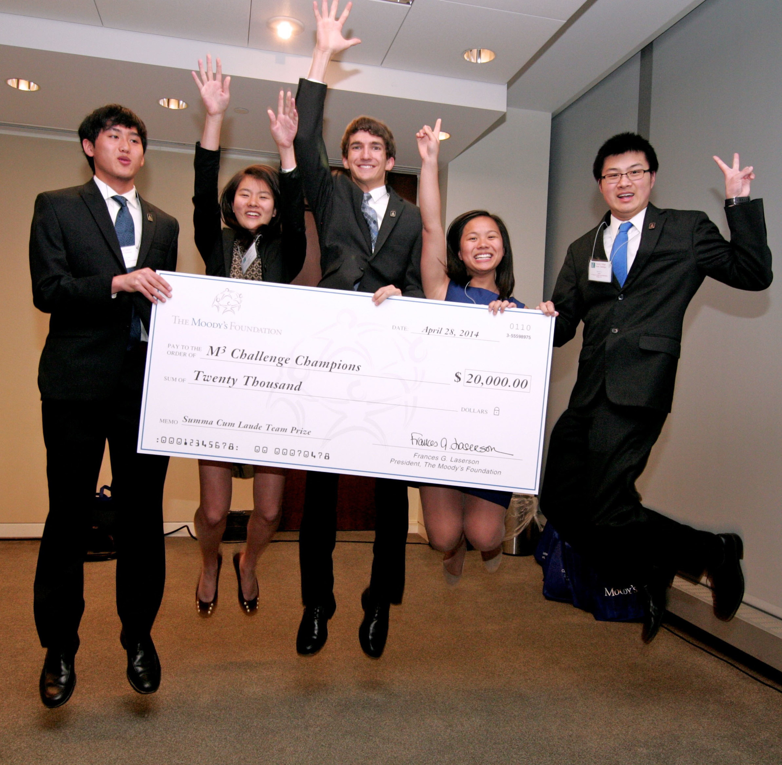 Students from North Carolina School of Science and Mathematics celebrate after being named the 2014 Moody's Mega Math Challenge Champions. From Left to Right: Steven Liao, Jennifer Wu, Zack Polizzi, Anne Lee, Irwin Li. (PRNewsFoto/SIAM)