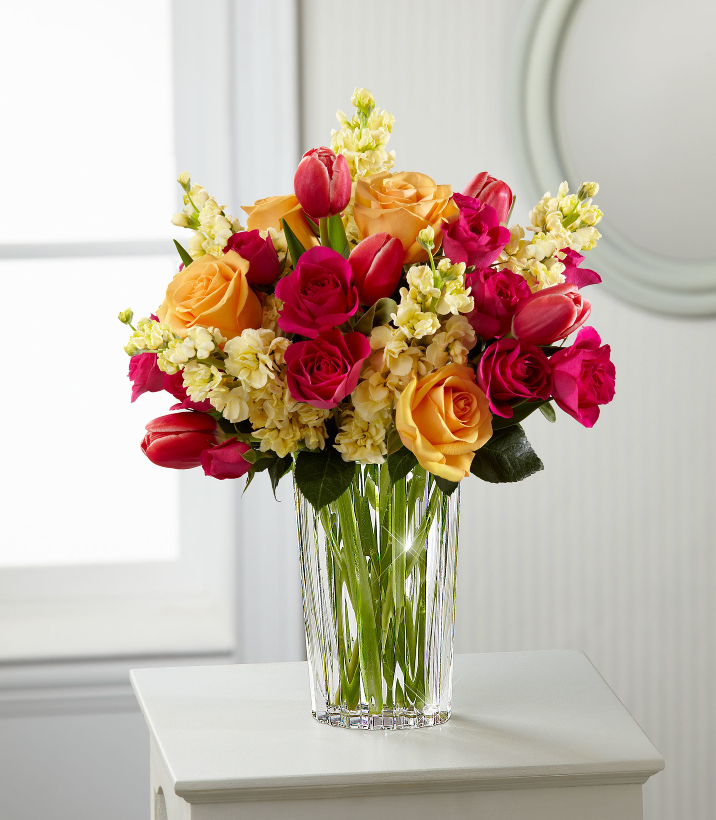 FTD's floral design expert forecasts bright oranges and pinks will be popular this Mother’s Day. The FTD Beauty and Grace Bouquet by Vera Wang showcases this trend and will bring a pop of color to the holiday.  (PRNewsFoto/FTD Companies, Inc.)