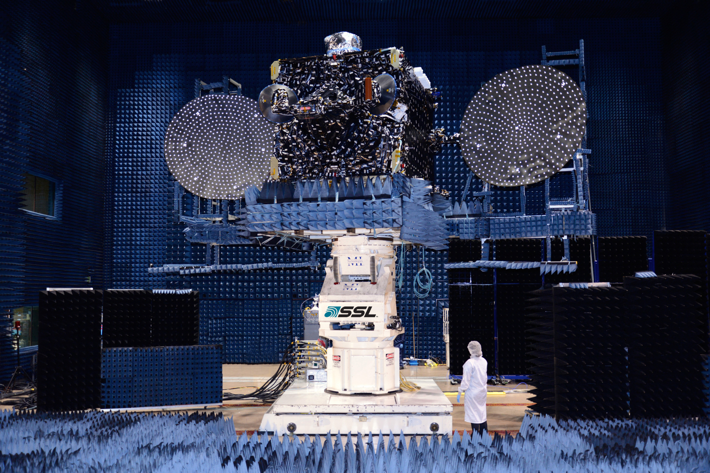 Optus 10 is shown here in the antenna test facility at SSL before it was shipped to launch base. (PRNewsFoto/MacDonald, Dettwiler and Assoc.)