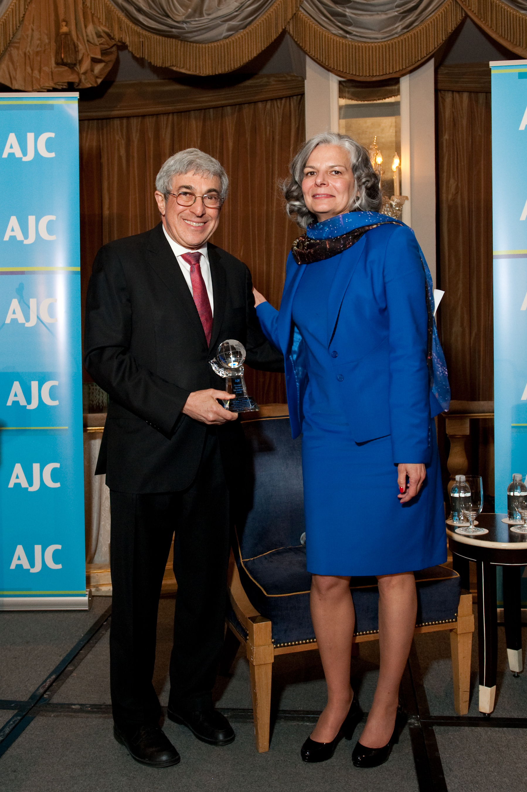 AJC President Stanley M. Bergman presents AJC Women's Global Leadership Award to Dr. Julie L. Gerberding, president of Merck Vaccines. (PRNewsFoto/American Jewish Committee)