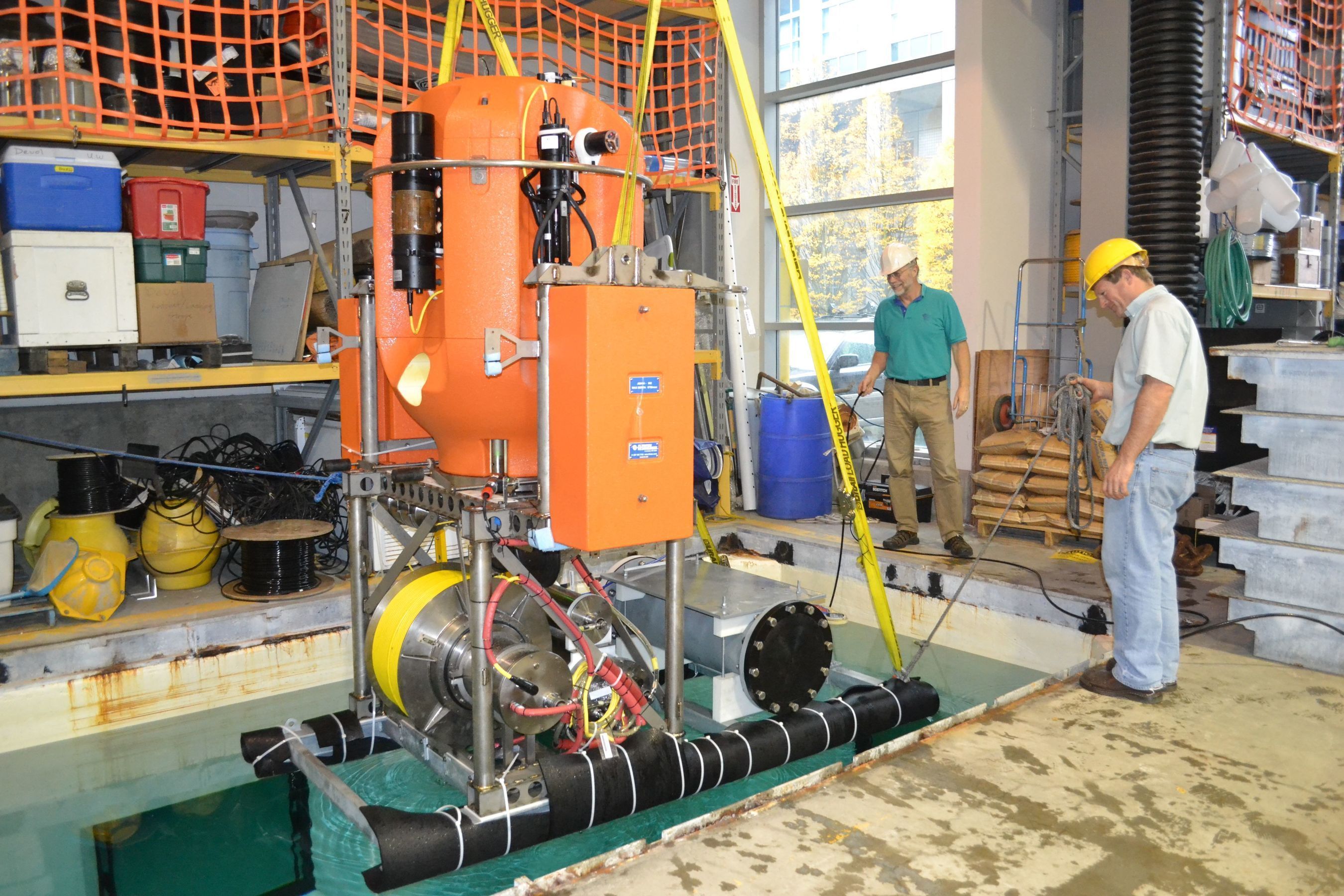 The initial shallow profiler undergoes testing at the University of Washington.  DeepWater Buoyancy's syntactic foam systems (in orange) will provide uplift and platform stability for the Regional Scale Nodes portion of the Ocean Observatories Initiative.  Photo: Mitch Elend, University of Washington (PRNewsFoto/DeepWater Buoyancy)
