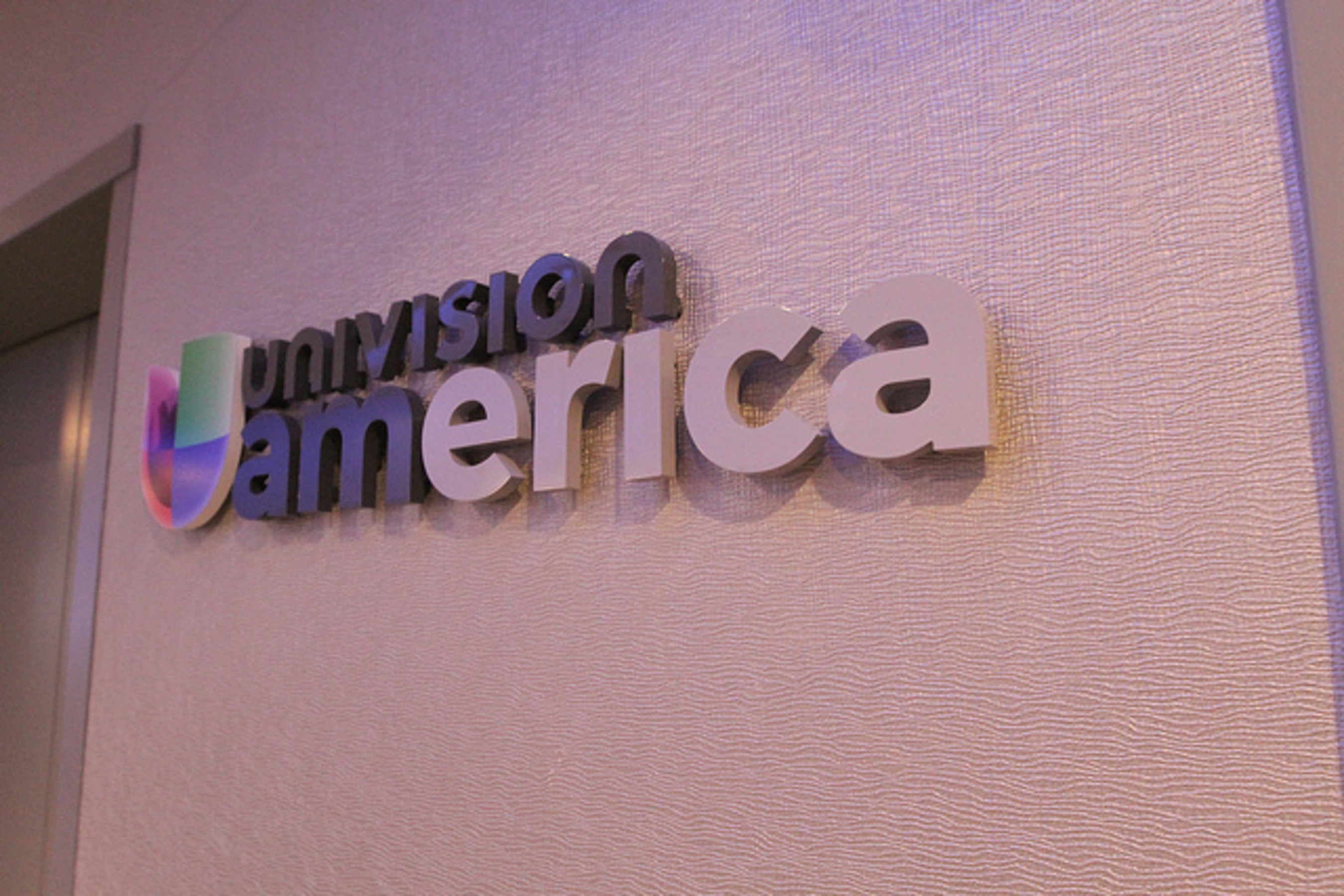 The Univision America sign consists of colored letters that pop from the wall and is overall friendly and approachable. (PRNewsFoto/Impact Architectural Signs)