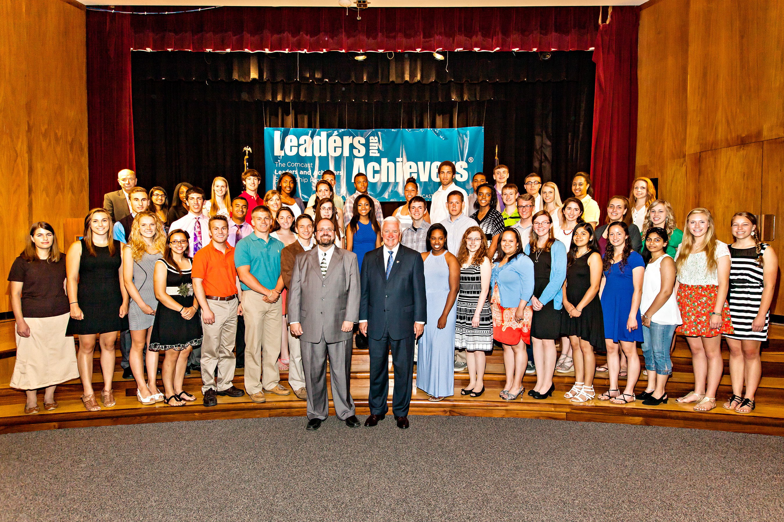 Pennsylvania Governor Tom Corbett (front right), Harrisburg Mayor Eric Papenfuse (front left), and Comcast Regional Vice President of Government Relations Frank Lynch (back row, left) are pictured with Pennsylvania high school seniors who were honored as Comcast Leaders & Achievers scholars at a ceremony in Harrisburg on Tuesday. (PRNewsFoto/Comcast Cable)