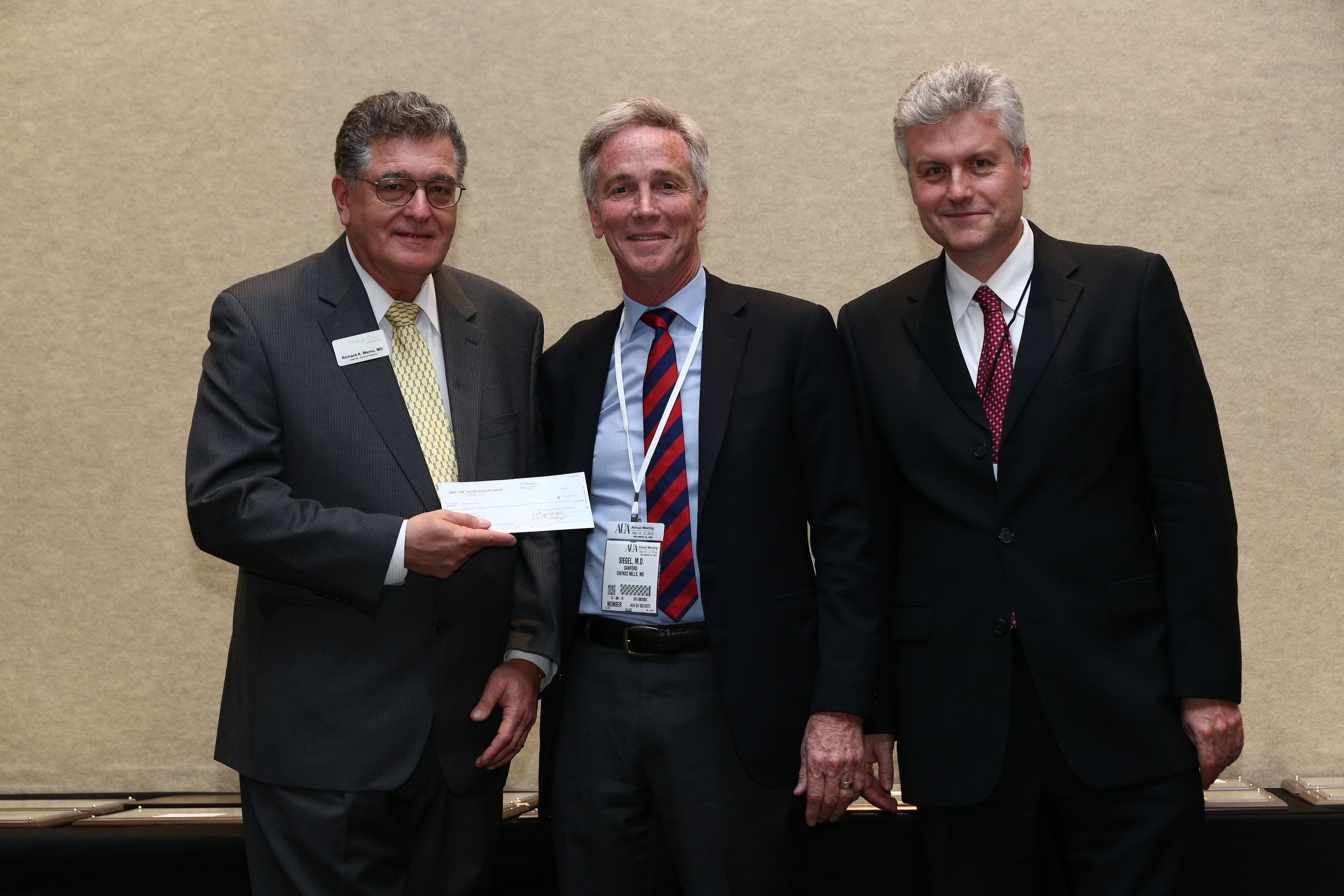 Dr. Richard Memo, Chair of Urology Care Foundation Board of Directors (left), Dr. Sanford Siegel, President and CEO, Chesapeake Urology Associates (center), and Dr. Johannes Vieweg, AUA Research Council Chair (right). (PRNewsFoto/Chesapeake Urology Associates)