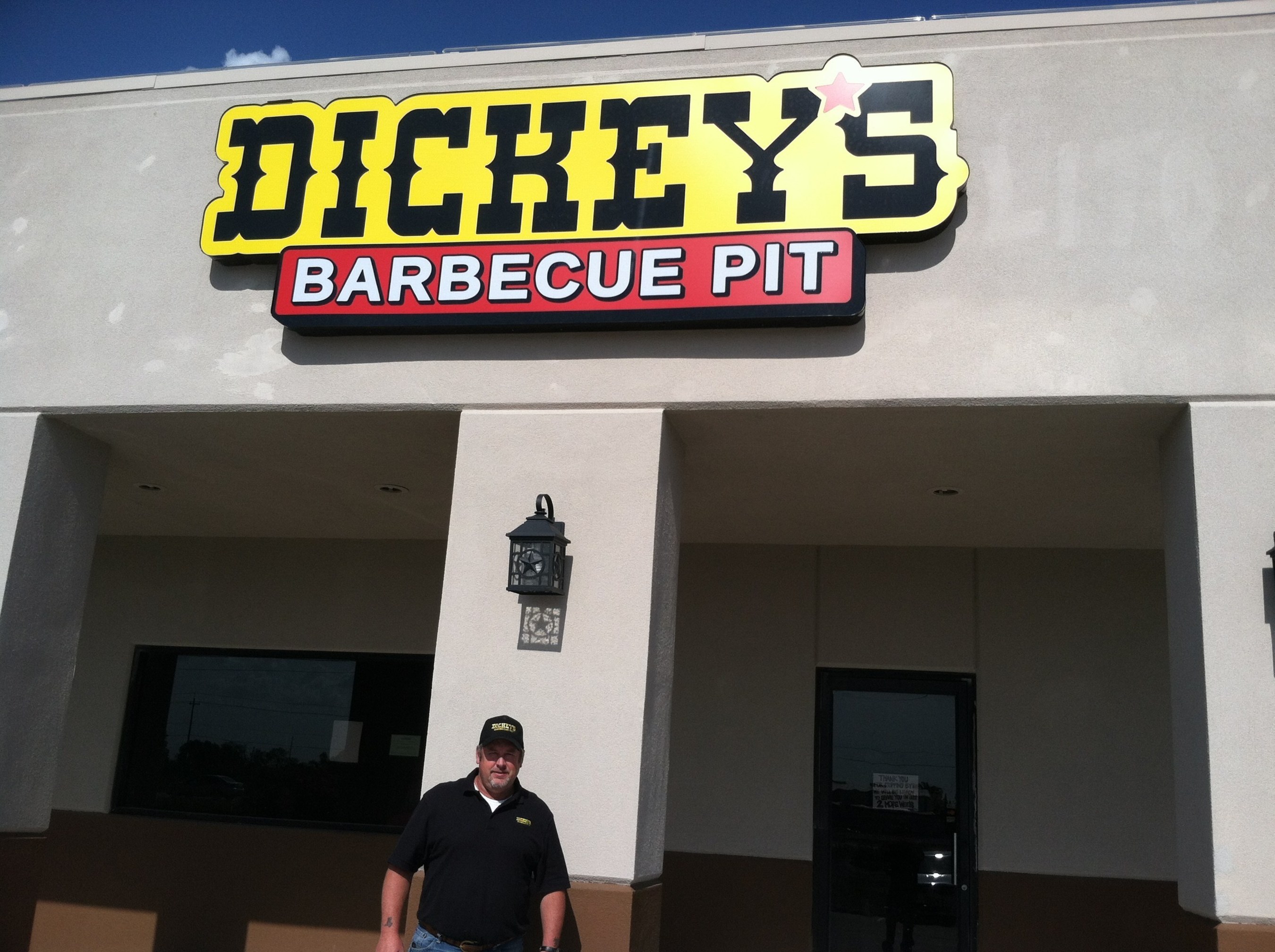 Marine Veteran Tracy Norris outside his new Dickey's Barbecue Pit in Sanger. The location opens Thursday with gift card giveaways. (PRNewsFoto/Dickey's Barbecue)