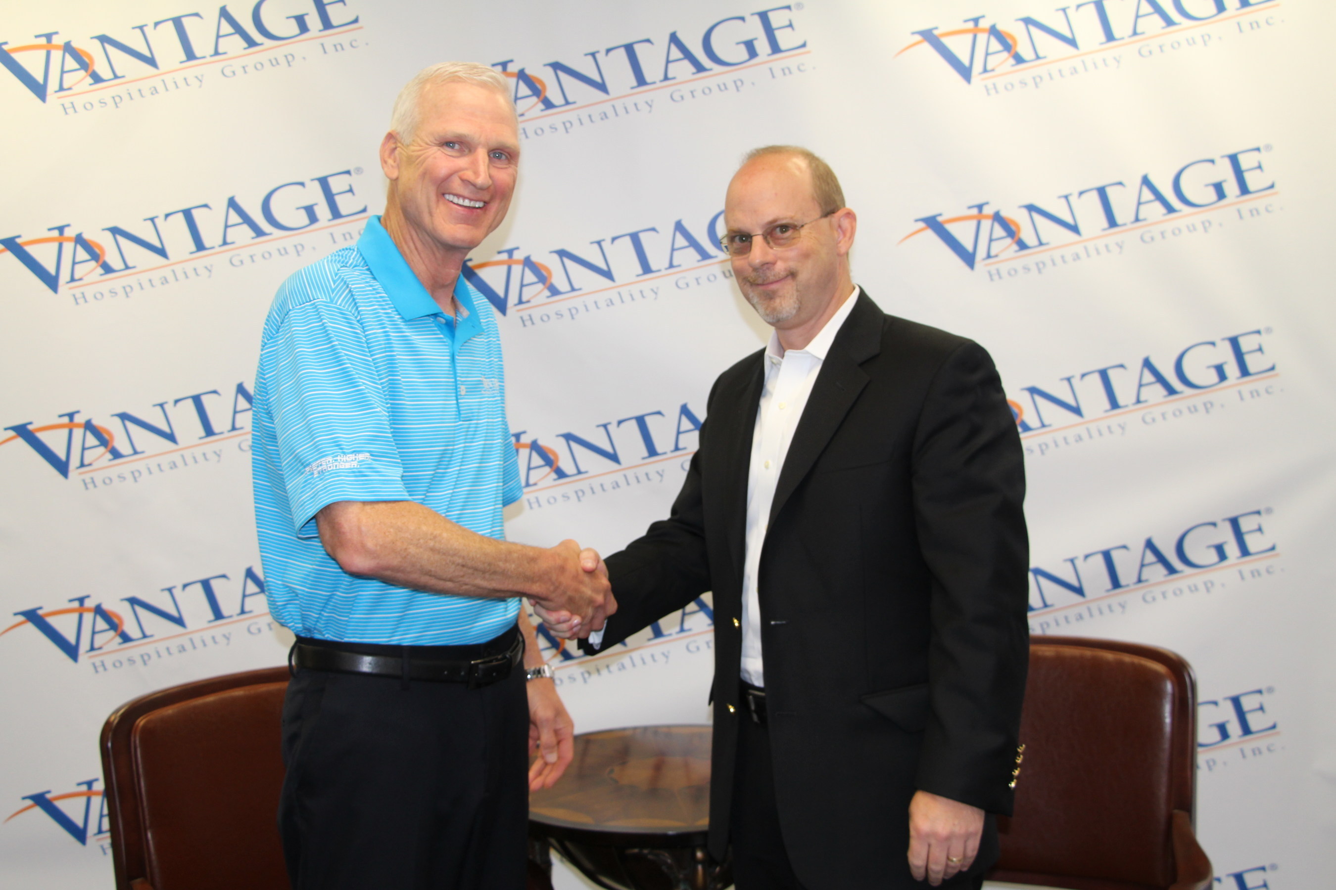 Vantage Hospitality President & CEO Roger Bloss (left) with America's Best Franchising President & CEO Sterling Stoudenmire after announcing that Vantage has agreed to acquire ABF's hotel brands - America's Best Inns & Suites, Country Hearth Inns & Suites, Jameson Inn, Jameson Suites, Signature Inn, and 3 Palms Hotels & Resorts, and ABF's license for the Budgetel Inns & Suites brand. (PRNewsFoto/Vantage Hospitality)