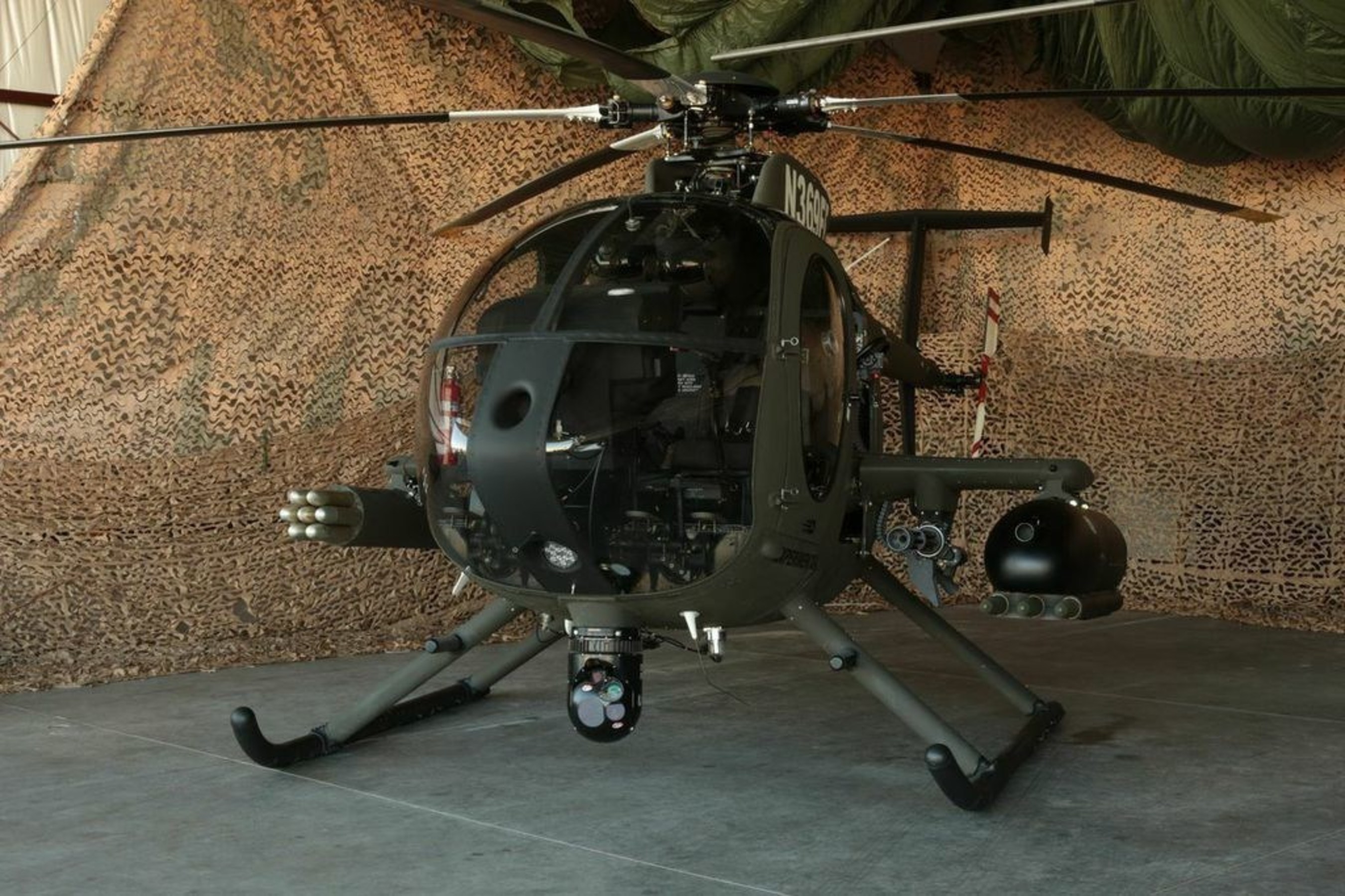 The MD 530G Scout Attack helicopter is a fully integrated gunship with a highly capable, customizable mission equipment package including the Moog Stores Management System (SMS), the Mace Aviation Extended Range Weapons Wing, FN Herstal Machine Gun Pods and Rocket Machine Pods, Dillon Aero M134D-H Mini-Gun, the L-3 Wescam MX-10D, and M260 rocket pod.

 (PRNewsFoto/MD Helicopters Inc.)