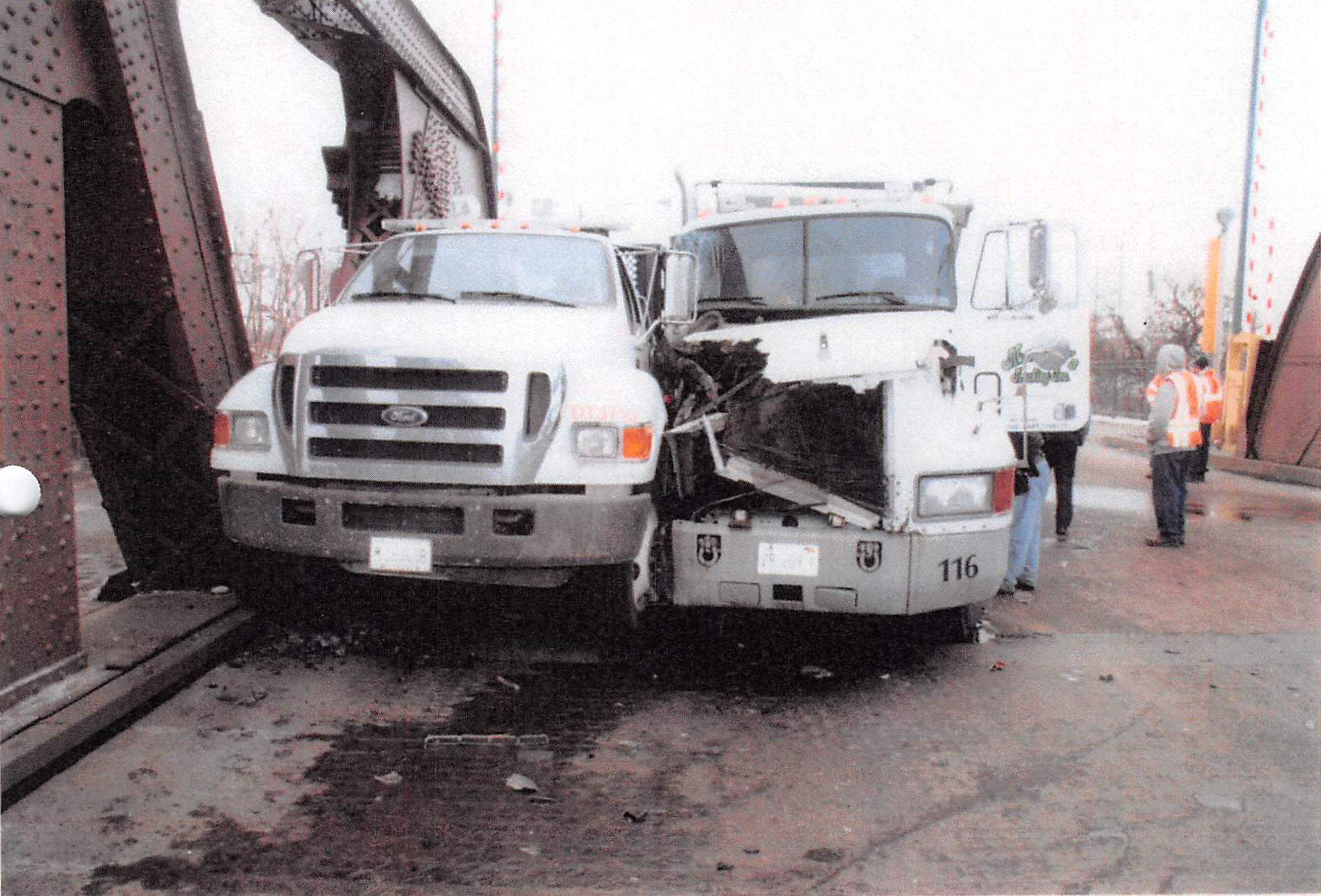 Deadly accident scene on 100th St. Bridge in Chicago. The family of the city worker killed in the accident received a $7.5 million jury award in the case that followed. (PRNewsFoto/Tomasik Kotin Kasserman, LLC)