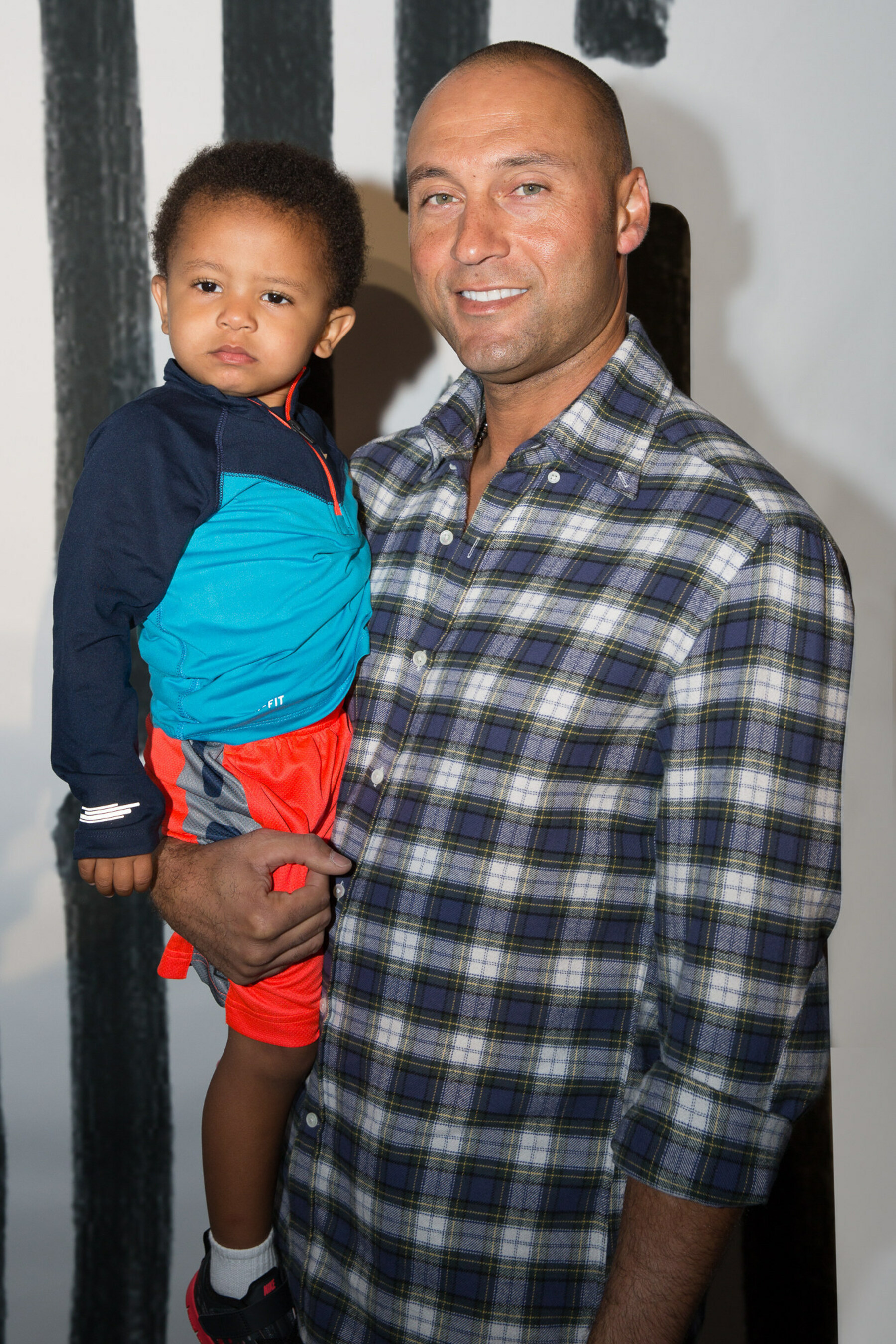 Derek Jeter and his nephew at the Kids Rock! Fashion Show (PRNewsFoto/Haddad Brands)