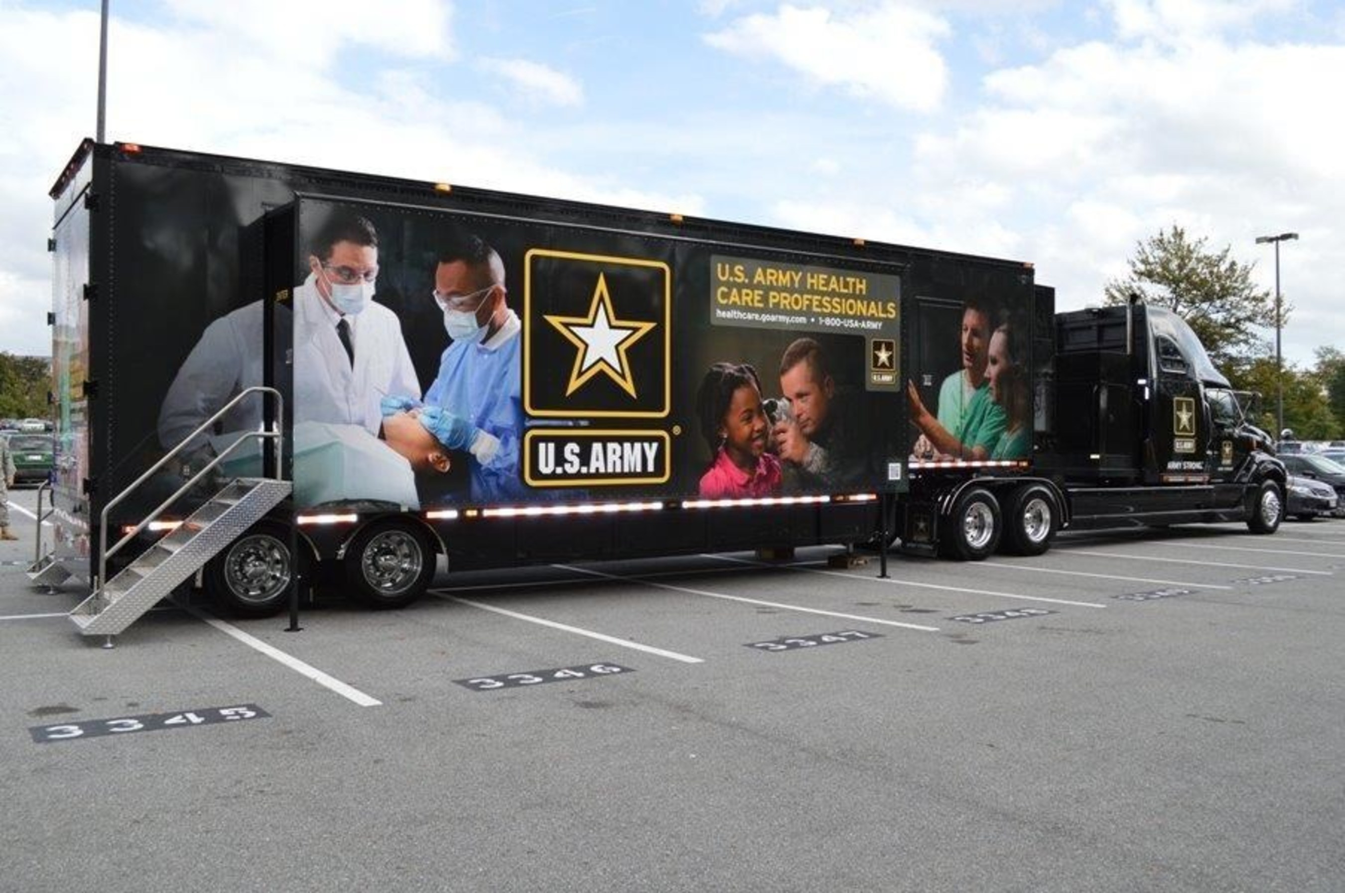 The U.S. Army's newest mobile exhibit, the Medical Marketing Semi, set up on the campus of the University of Maryland at College Park. Official Army photograph by Randy Lescault.