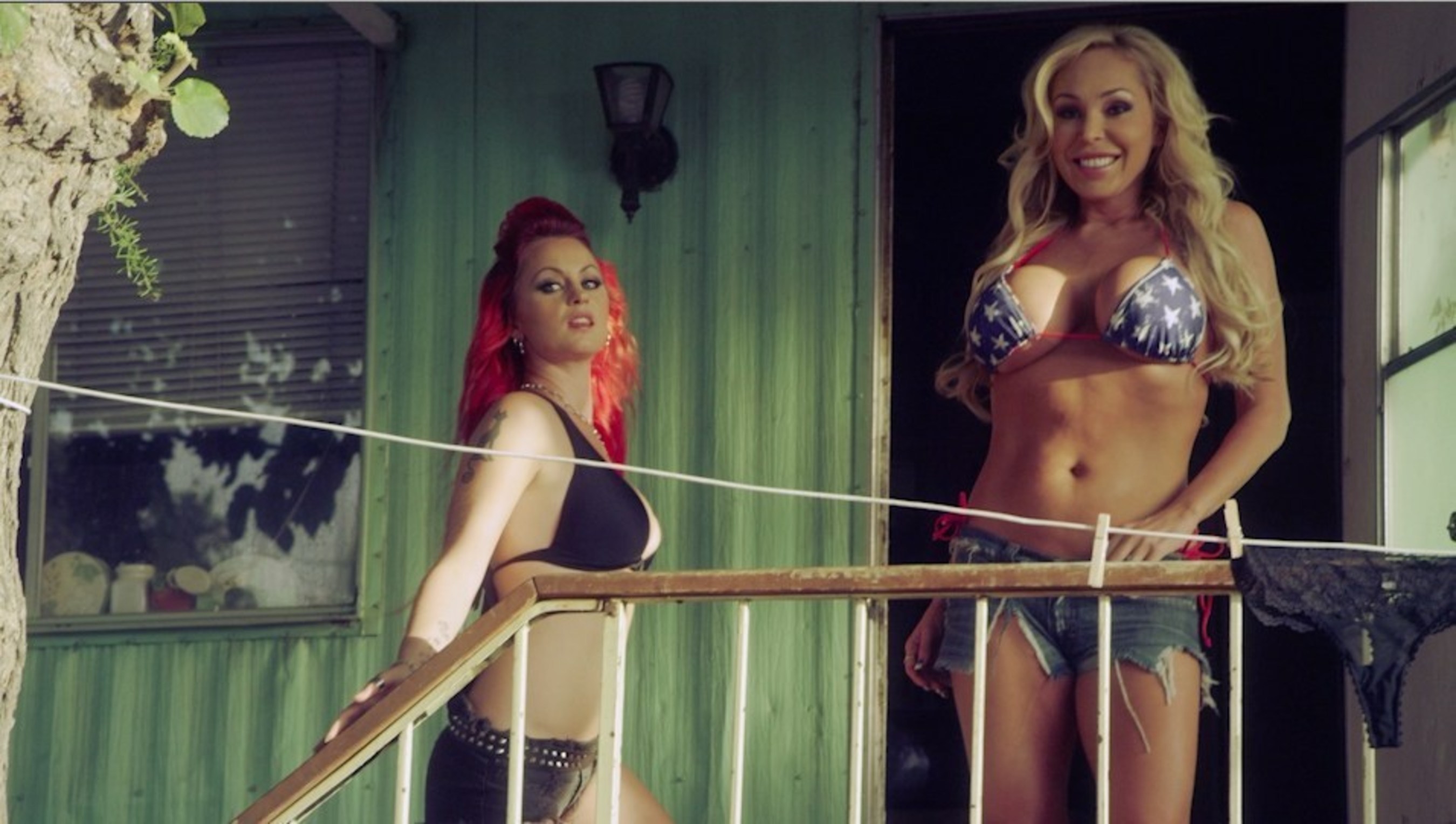 "Supergirl" Sara Hedgren with Mary Carey in Kicking Harold's new music video for "Kill You"