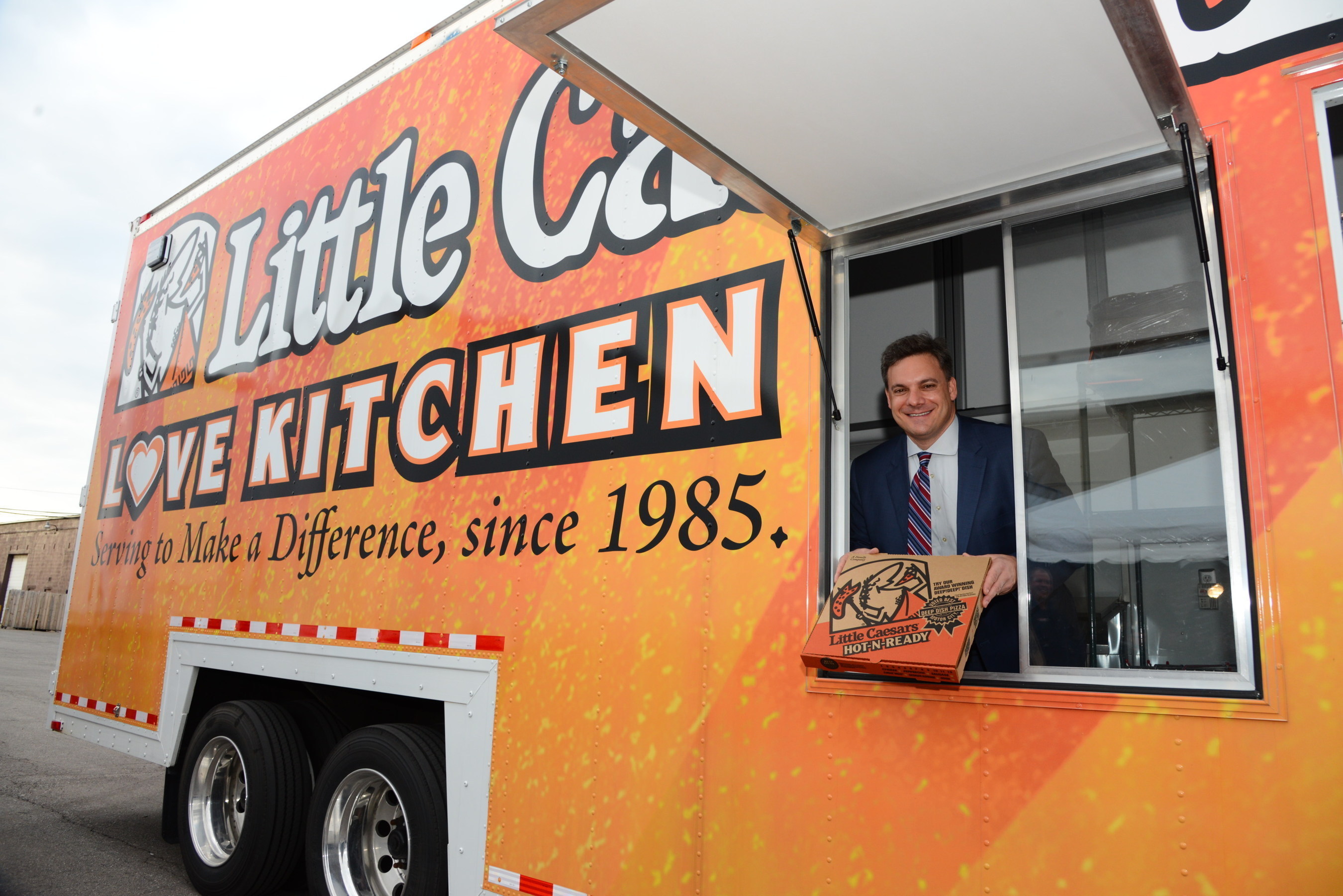 Little Caesars President and CEO David Scrivano celebrates the launch of the a new Love Kitchen.