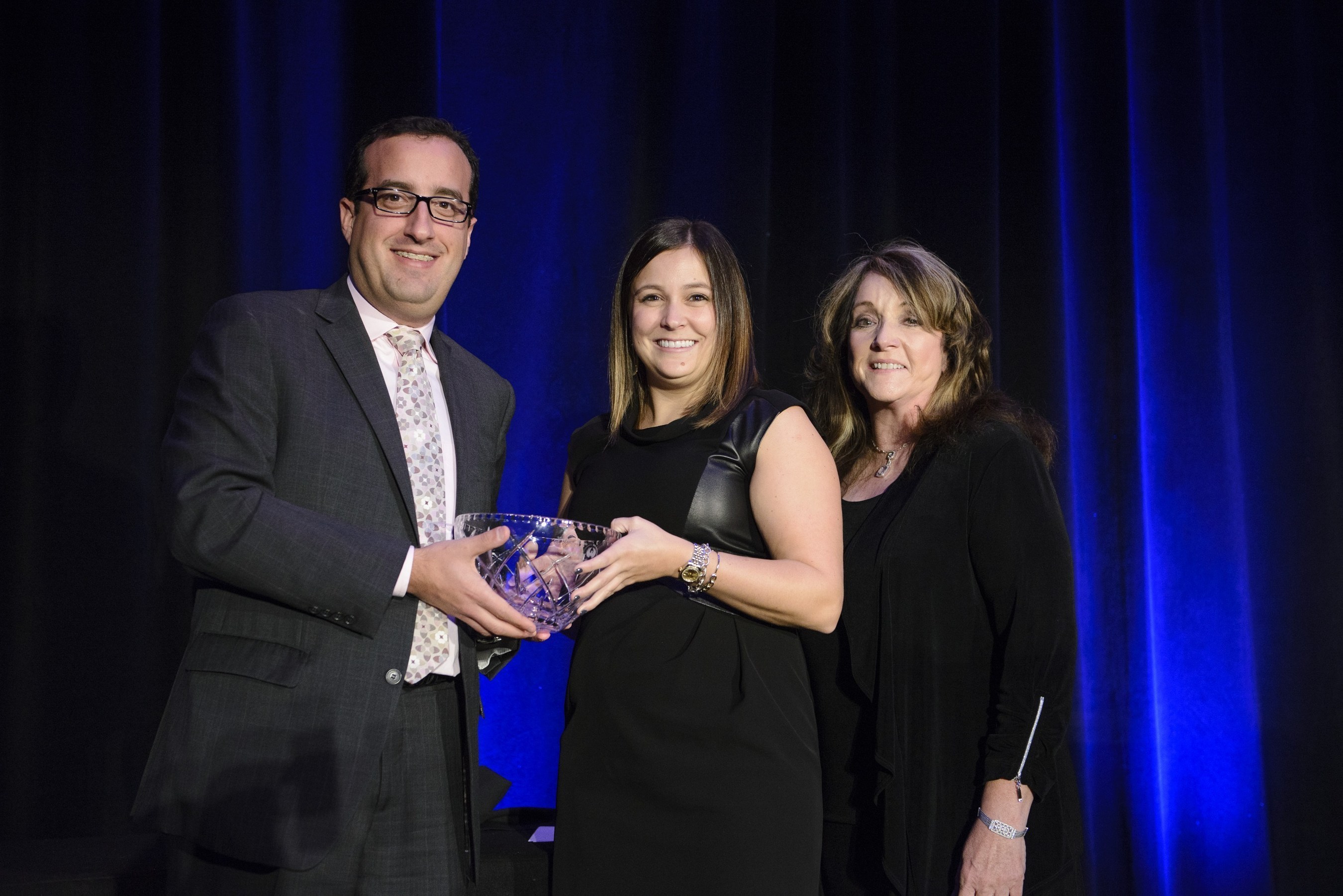 (Left to Right): Neil Hirsch, APR, President of PRSA Georgia Chapter and Manager, Global External Communications with Novelis presents the Best of Phoenix Award to Lindsay Ash with MSLGROUP Atlanta. Also pictured is Juliann Kaiser, APR of Kaiser Marketing Group and a Past President of PRSA Georgia.