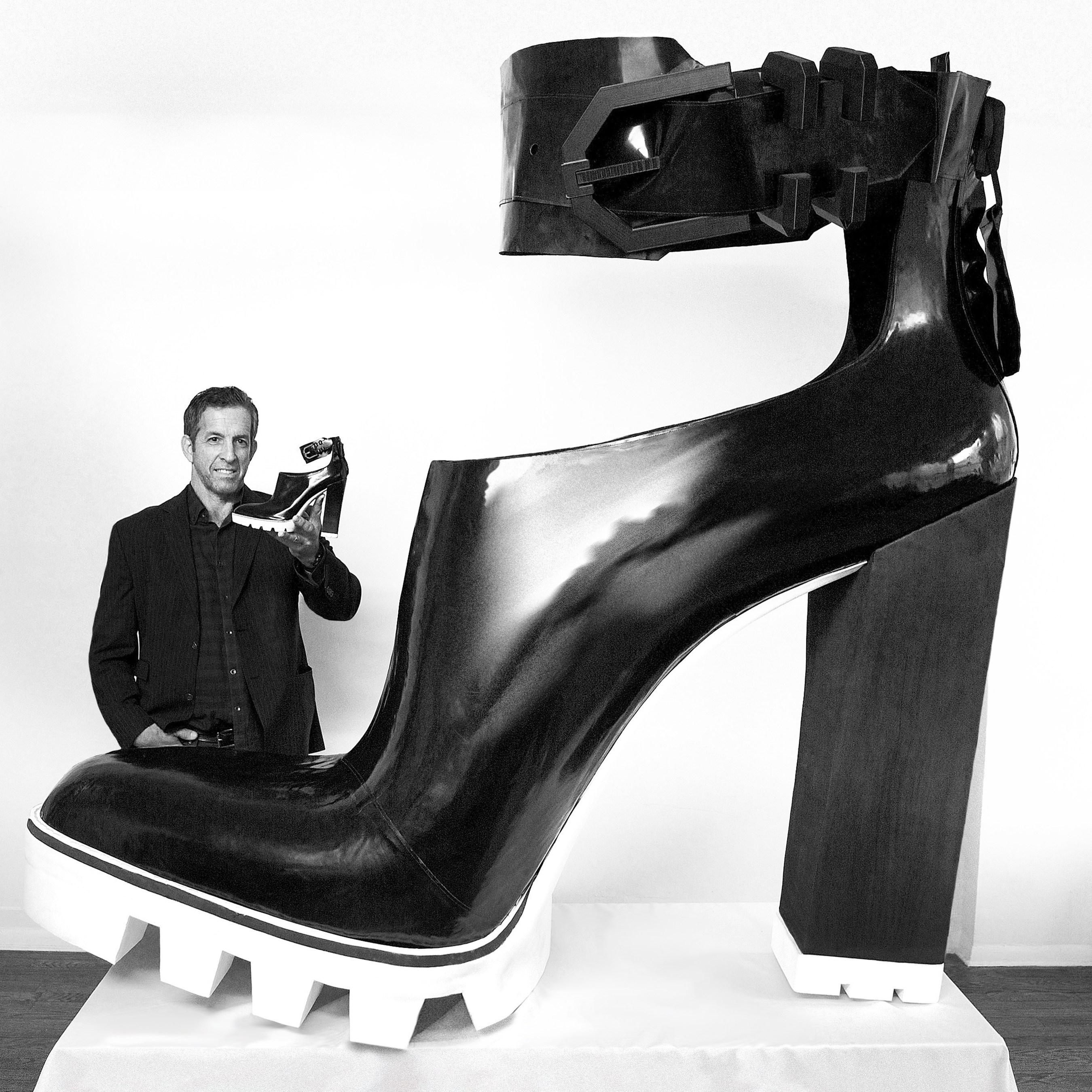 Fashion Designer Kenneth Cole with his Guinness World Record Largest High-Heeled Shoe