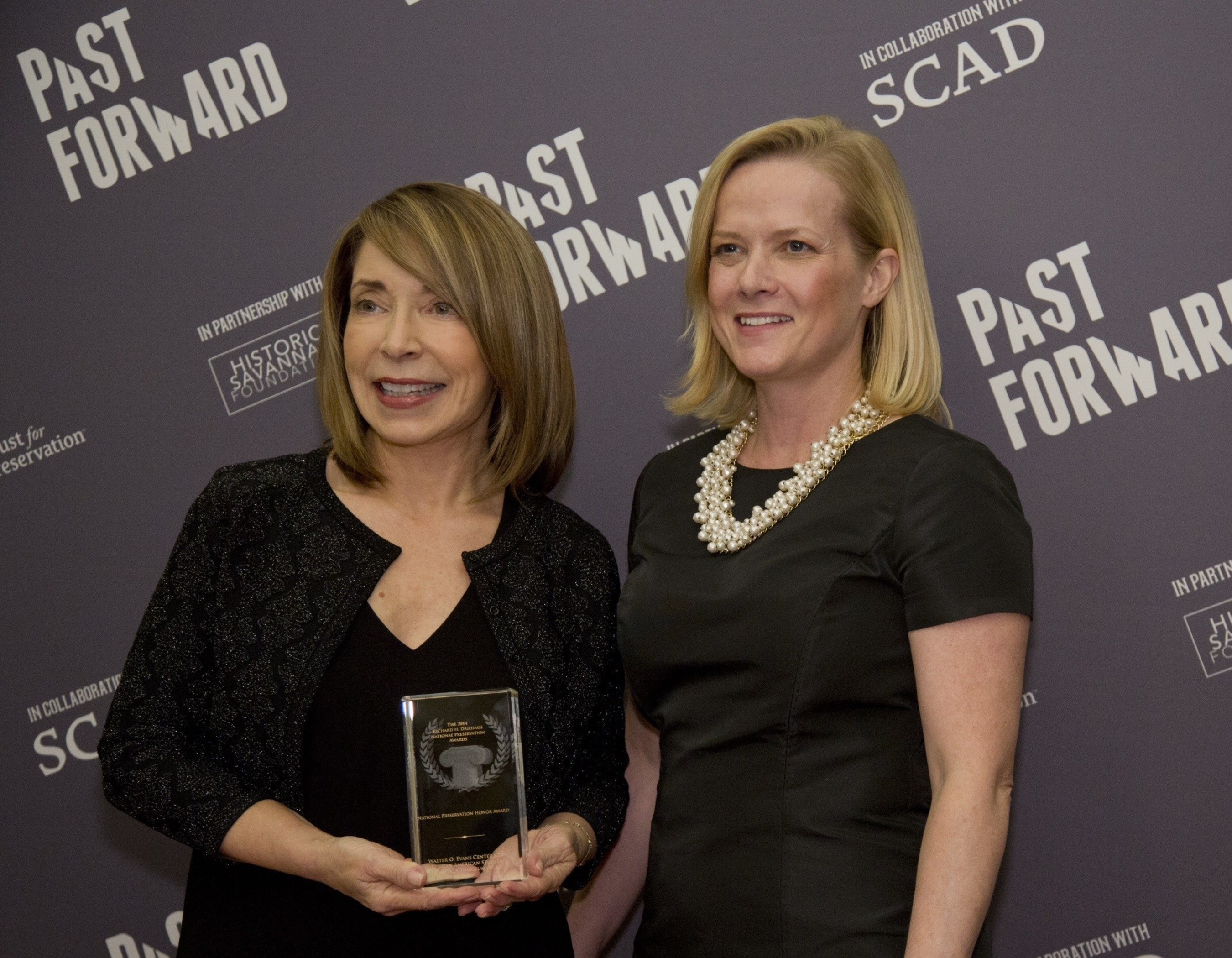Paula Wallace, SCAD president and founder, with Stephanie Meeks, president and chief executive officer National Trust for Historic Preservation, at the 2014 Richard H. Driehaus National Preservation Awards in Savannah, Georgia, on November 13, 2014.