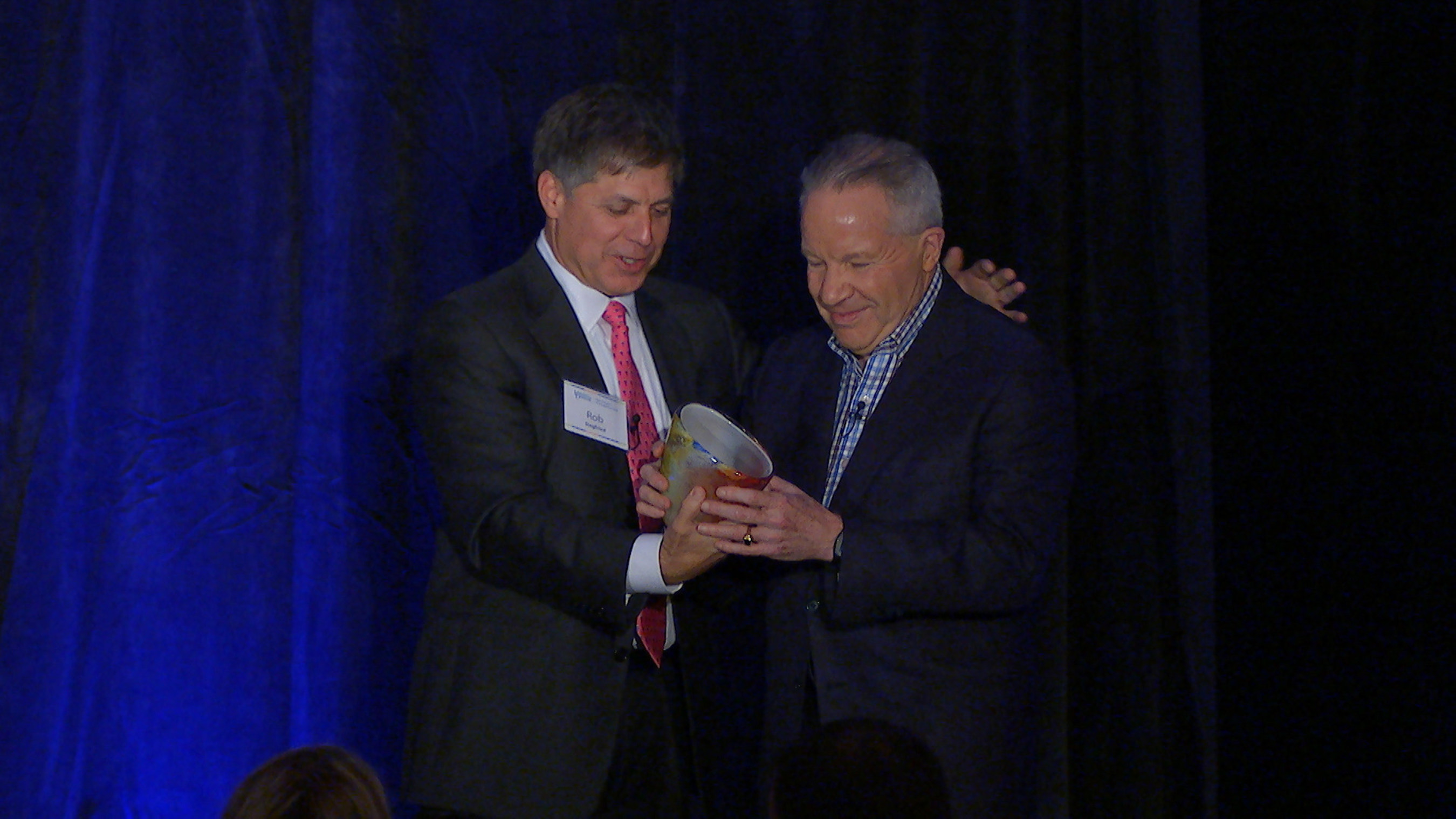 Rob Siegfried presents 1st Siegfried Award for Entrepreneurial Leadership to Dan Sullivan, CEO of Strategic Coach Inc.