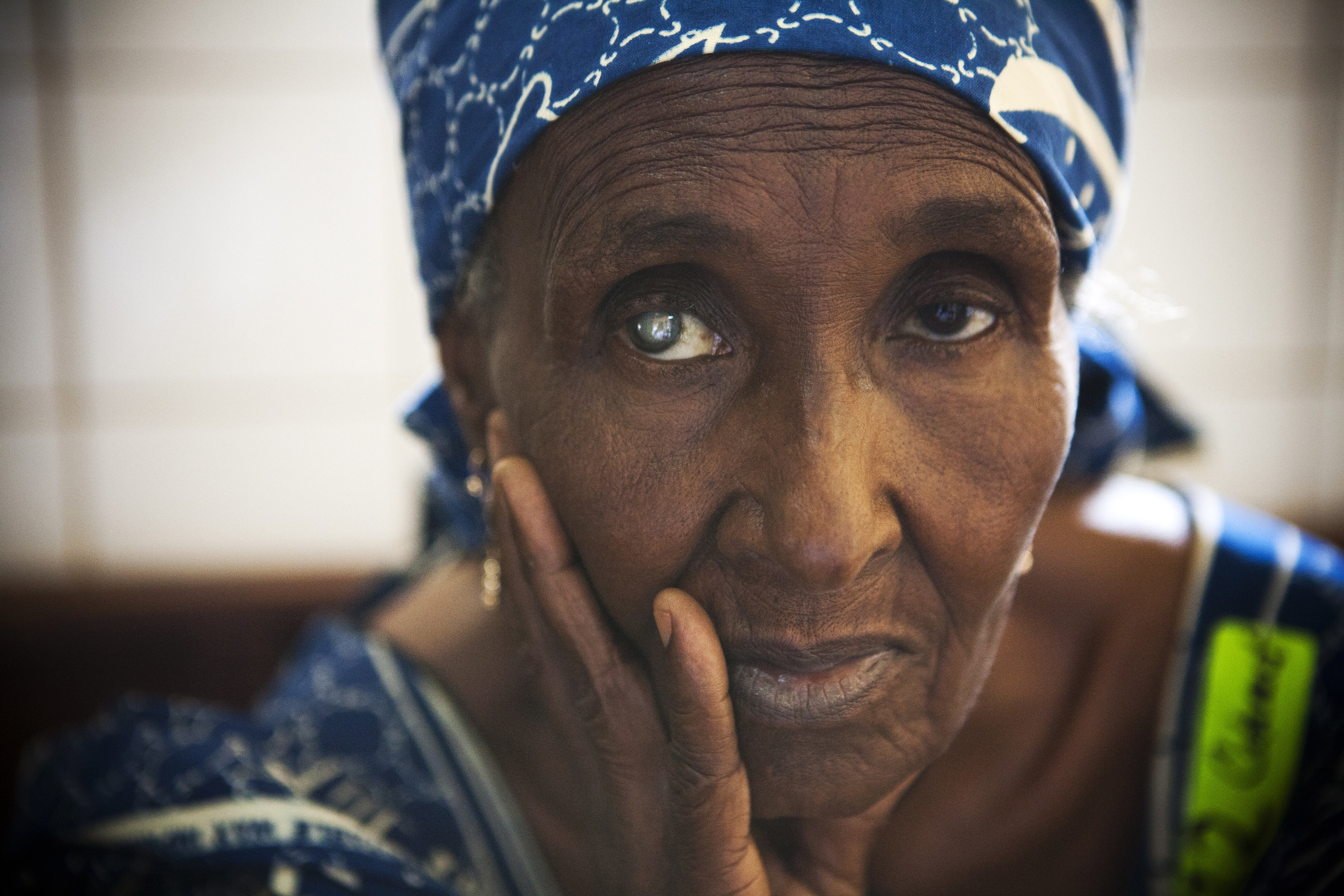 Aissatou, 61, whose vision loss has caused her to give up her livelihood of herding cattle, awaits a medical screening of her cataract at a hospital in Cameroon. Learn more: orbis.org