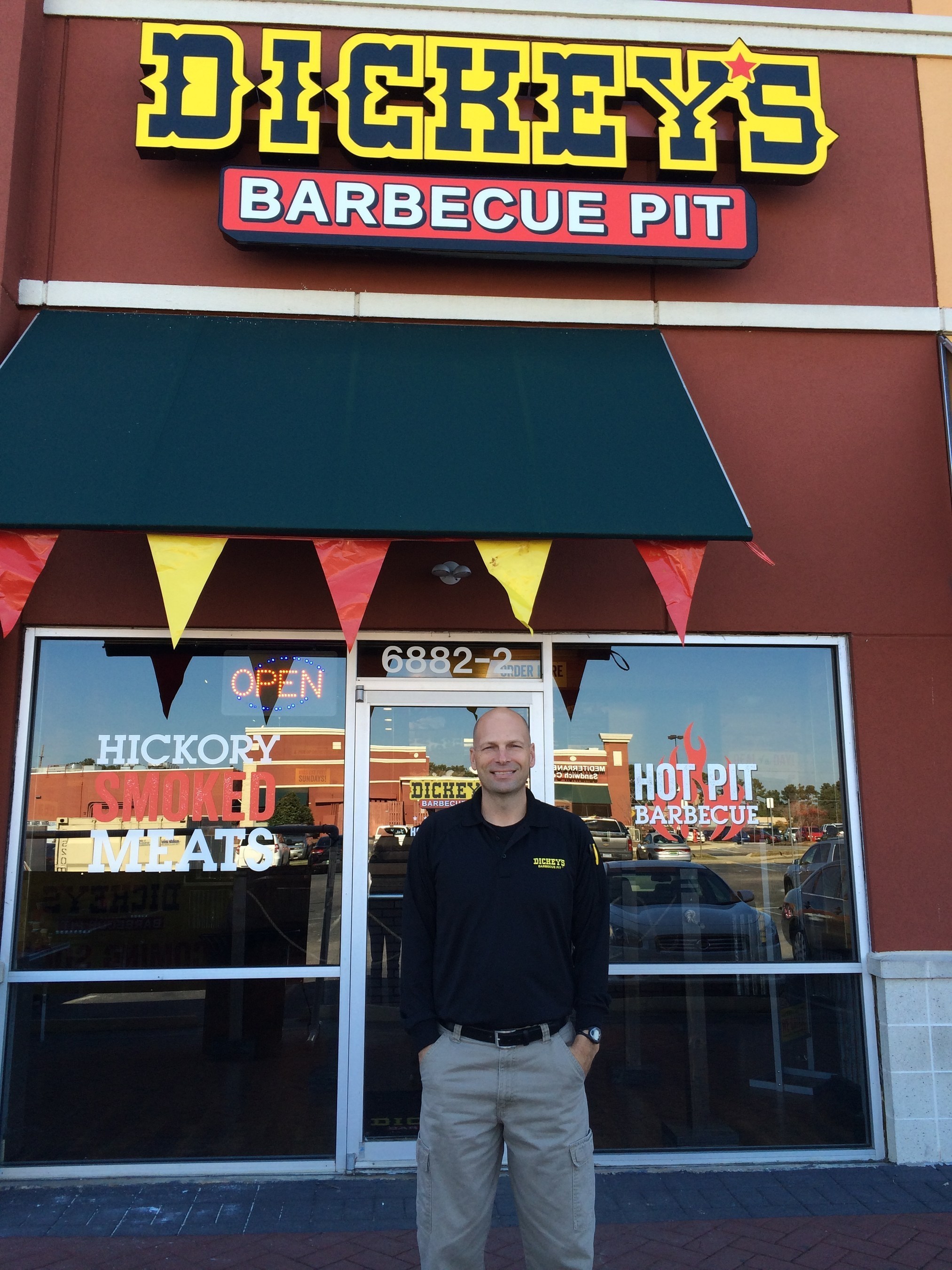 John Lockett outside his new Dickey's Barbecue Pit location in Daphne. The three day grand opening kicks off Thursday.