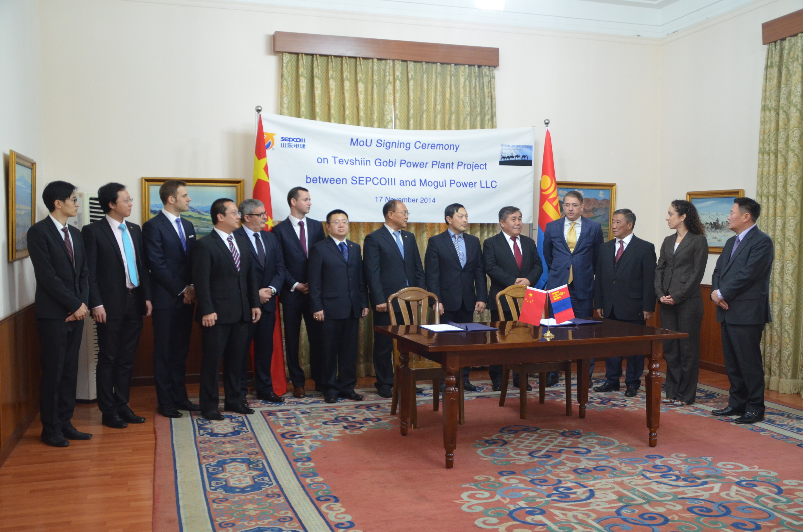 The Mogul Power LLC, Firerbird and SepcoIII teams join the Ambassador of Mongolia, Mr. Sukhbaatar Ts., and the Senior Counsellor of Commercial and Economic affairs, Mr. Khurrenbaatar B at the signing of the MOU at the Embassy of Mongolia in Beijing.