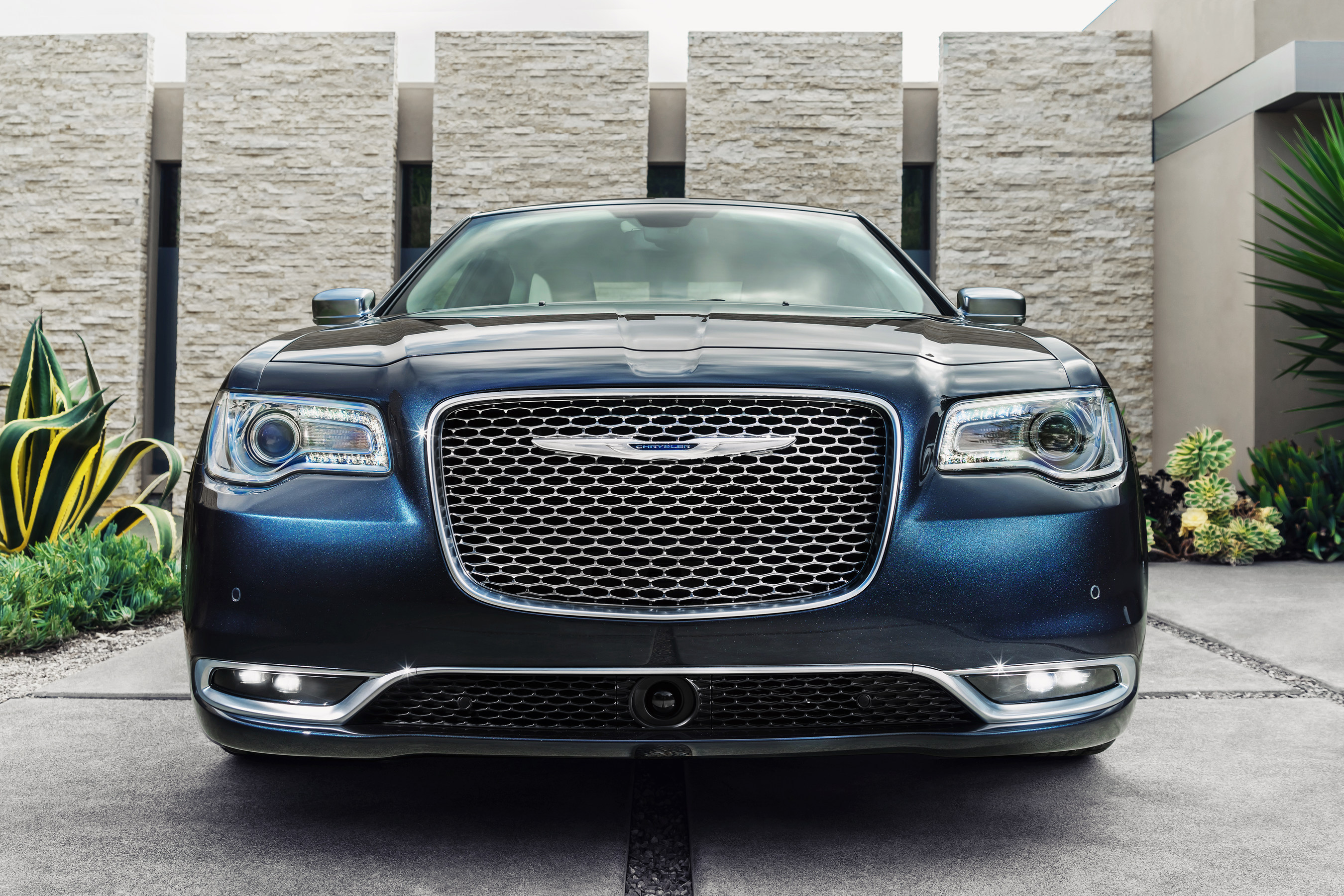 The new 2015 Chrysler 300 highlights six decades of ambitious American ingenuity through iconic design proportions inspired by historic 1955 and 2005 models - world-class quality, materials and refinement, best-in-class V-6 highway fuel economy, plus segment-exclusive innovations - all at the same $31,395 starting price as its predecessor.