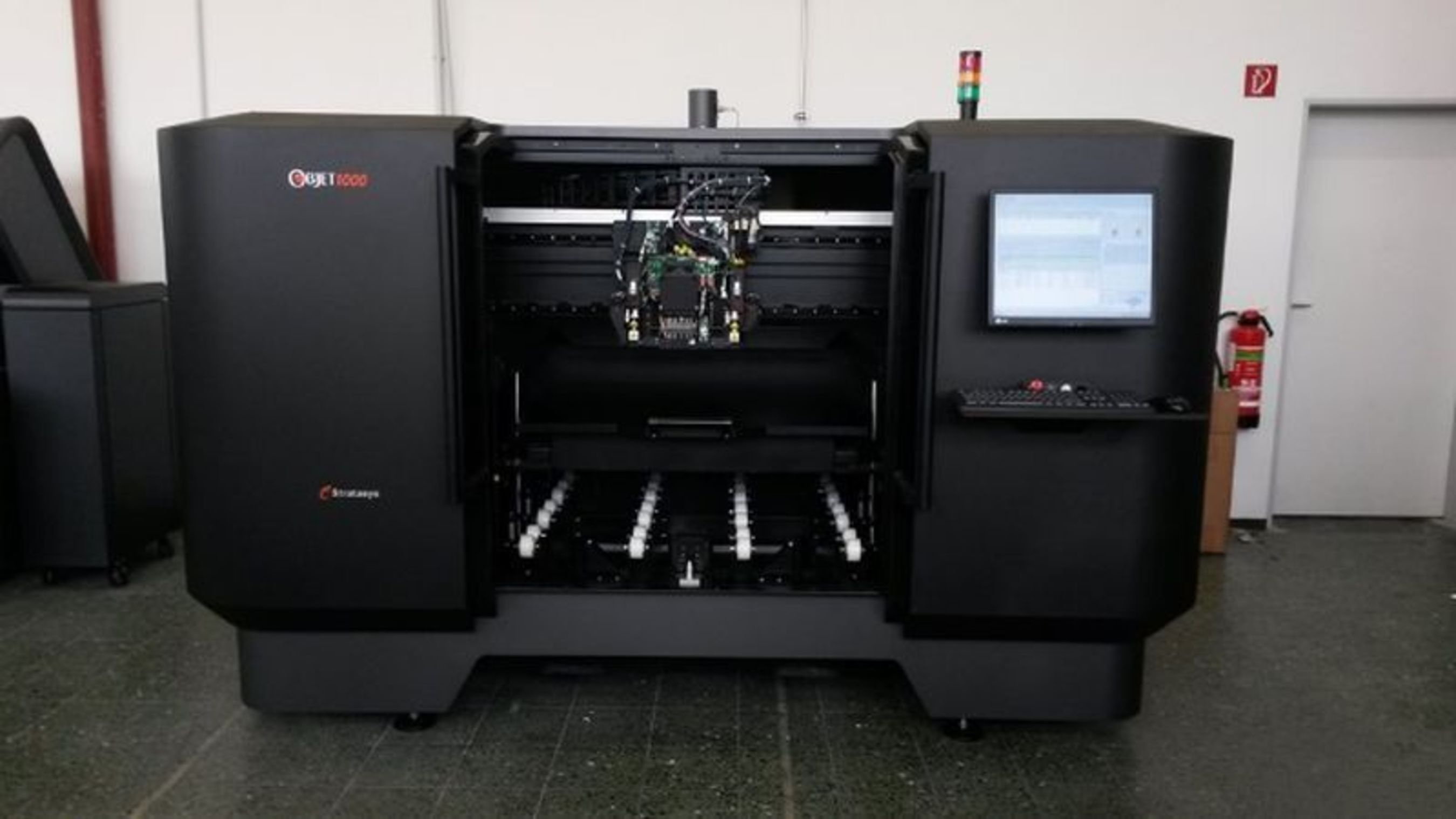Aachen University has the worldâeuro(TM)s largest multi-material 3D printer from Stratasys, the Objet1000, with the ability to produce parts combining hard and soft materials, all in a single build. (PRNewsFoto/Stratasys Ltd)